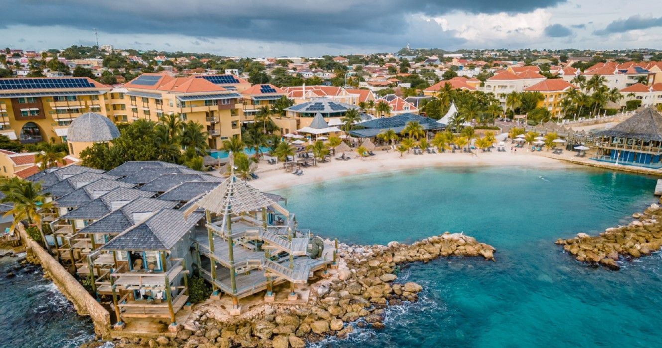 Tropical luxury resort Curacao with private beach and palm trees