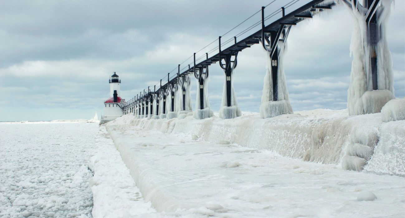 Michigan City, Indiana lighthouse and pier in ice and snow