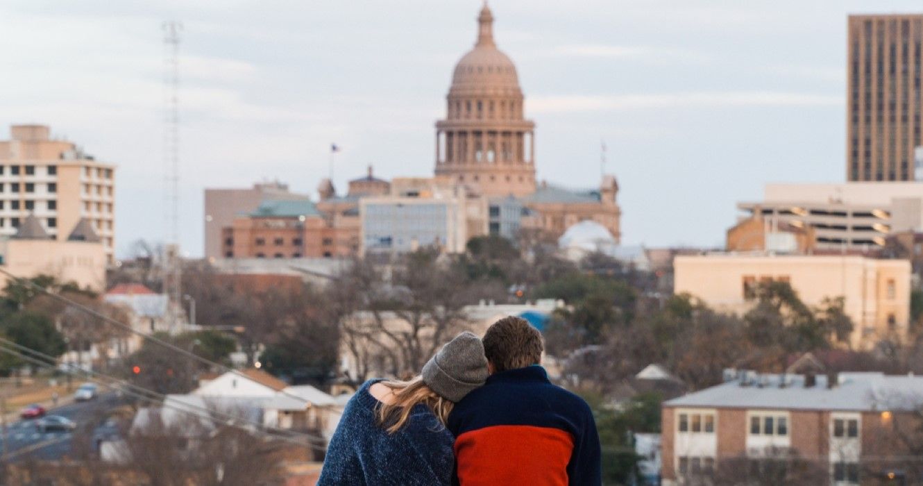 Couple looking at the Capitol building in Austin, Texas
