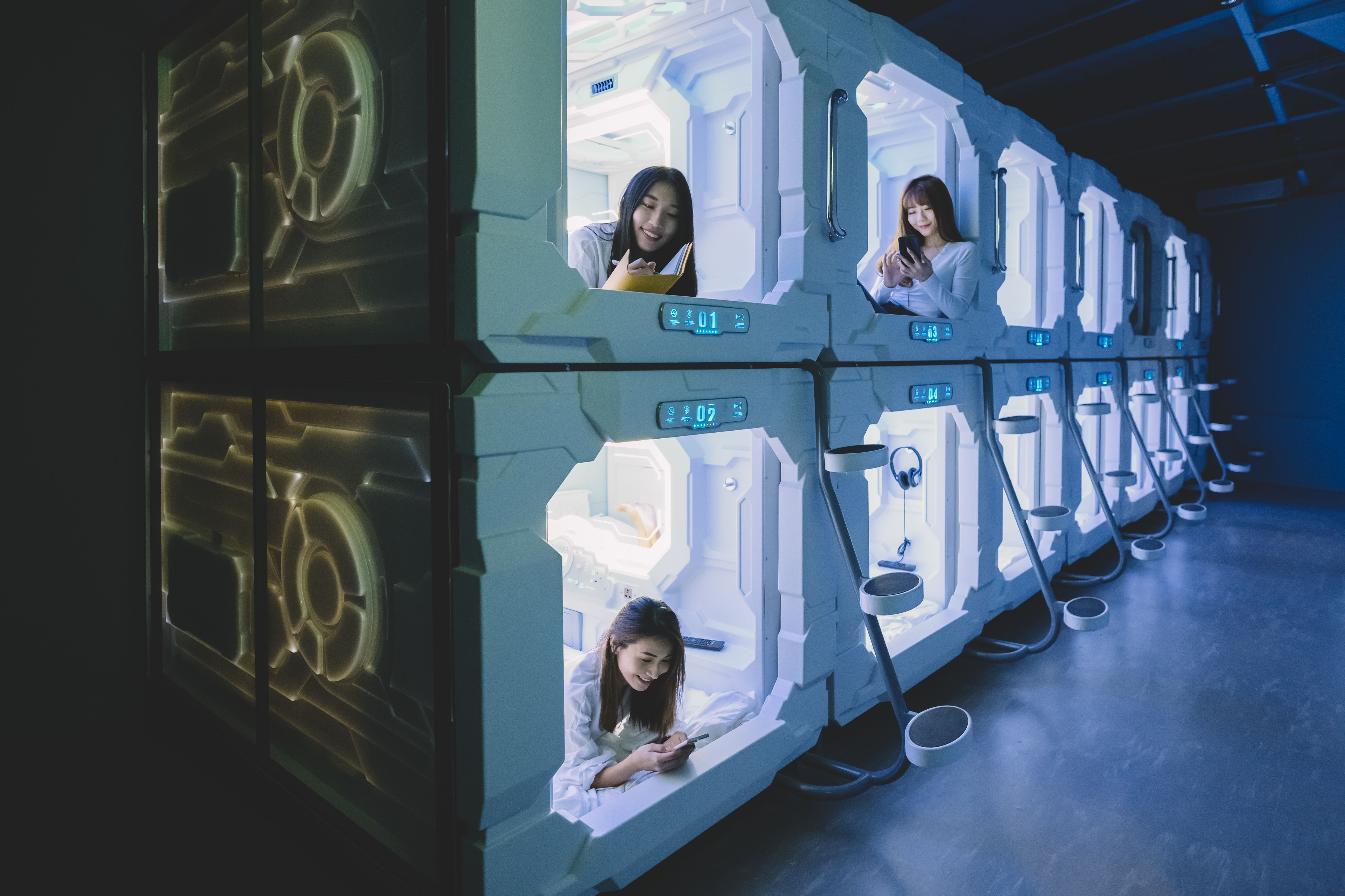 Stay In This Kuala Lumpur Capsule, Space-Age Hostel With Futuristic Robots