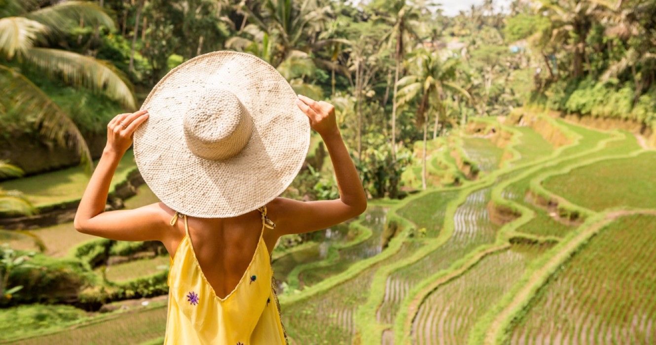 Girl vacationing in Ubud, Bali while looking at a beautiful view. 