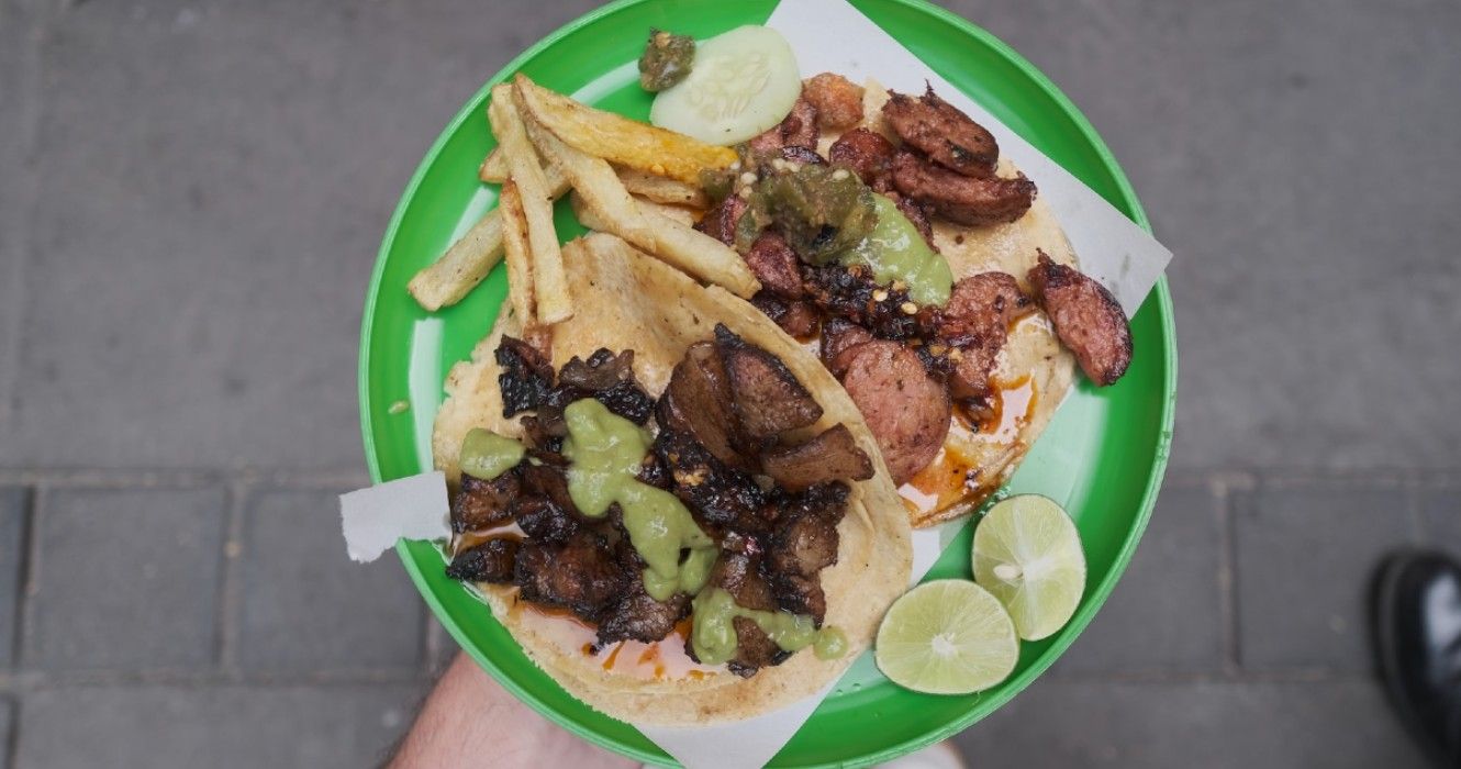 Street tacos on a plate in Mexico City MX