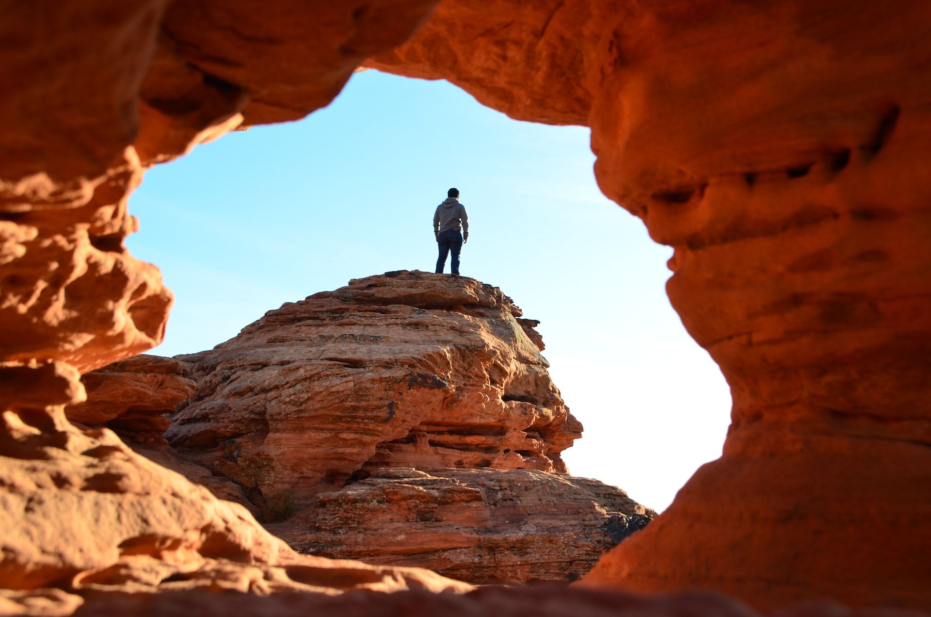 Man standing on a rock in a state park in St. George, Utah