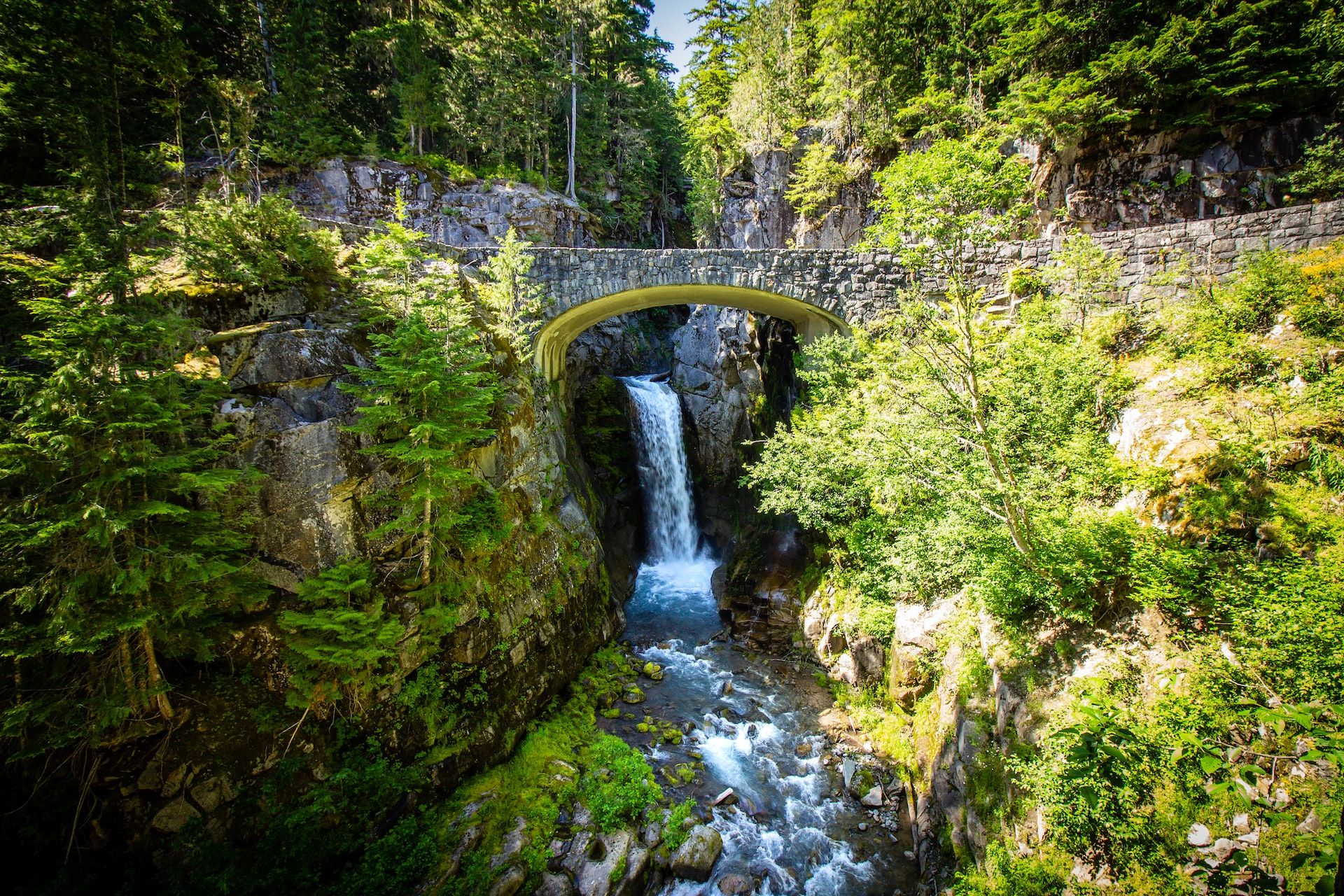 A bridge and waterfall in Mt Rainier National Park