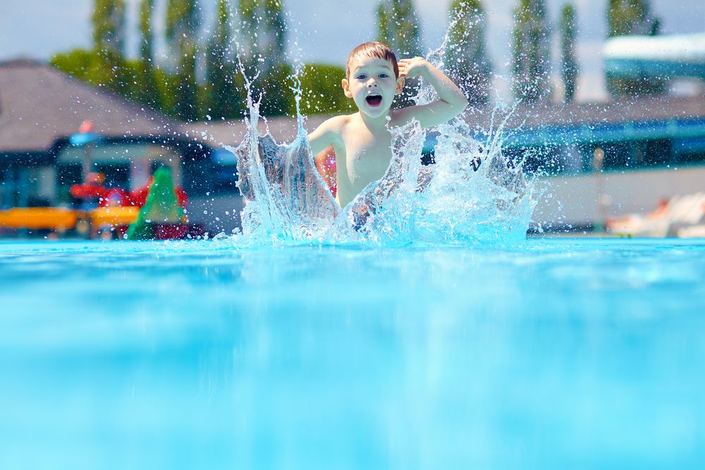 A kid swimming 