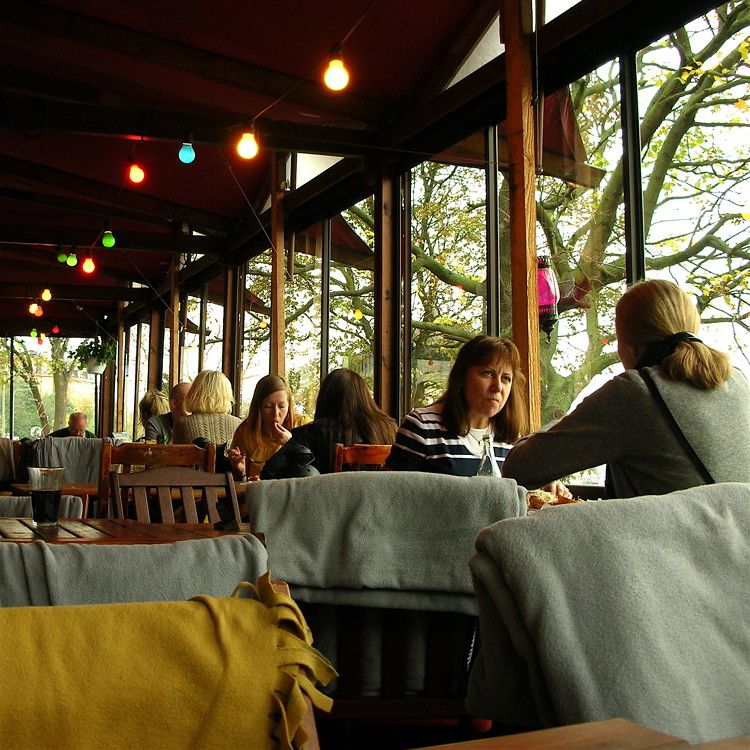 Patrons Dining At A Restaurant In Stockholm
