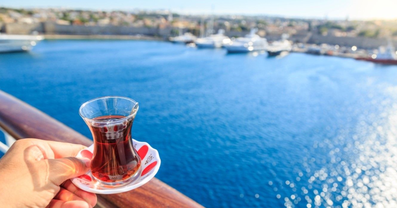 A cup of tea with view of the sea in Rhodes, Greece from cruise ship