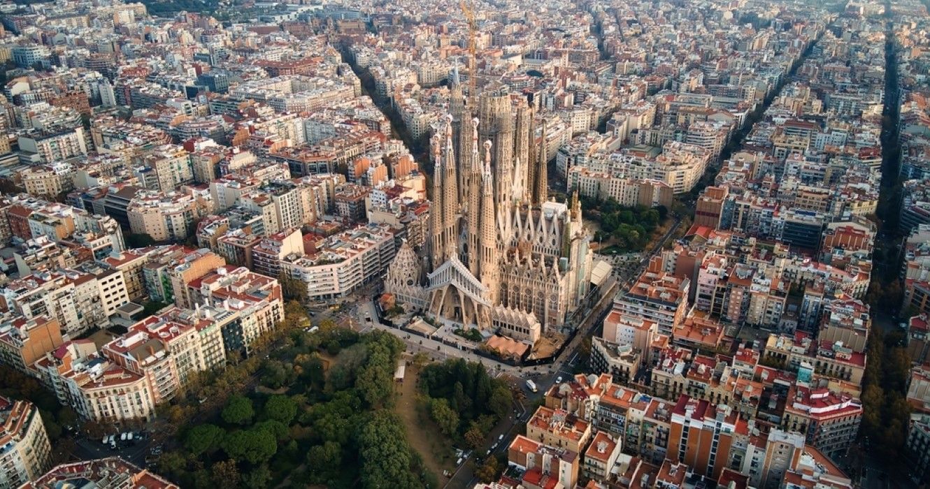 Aerial drone view of Barcelona, Spain, with the Sagrada Familia in the center