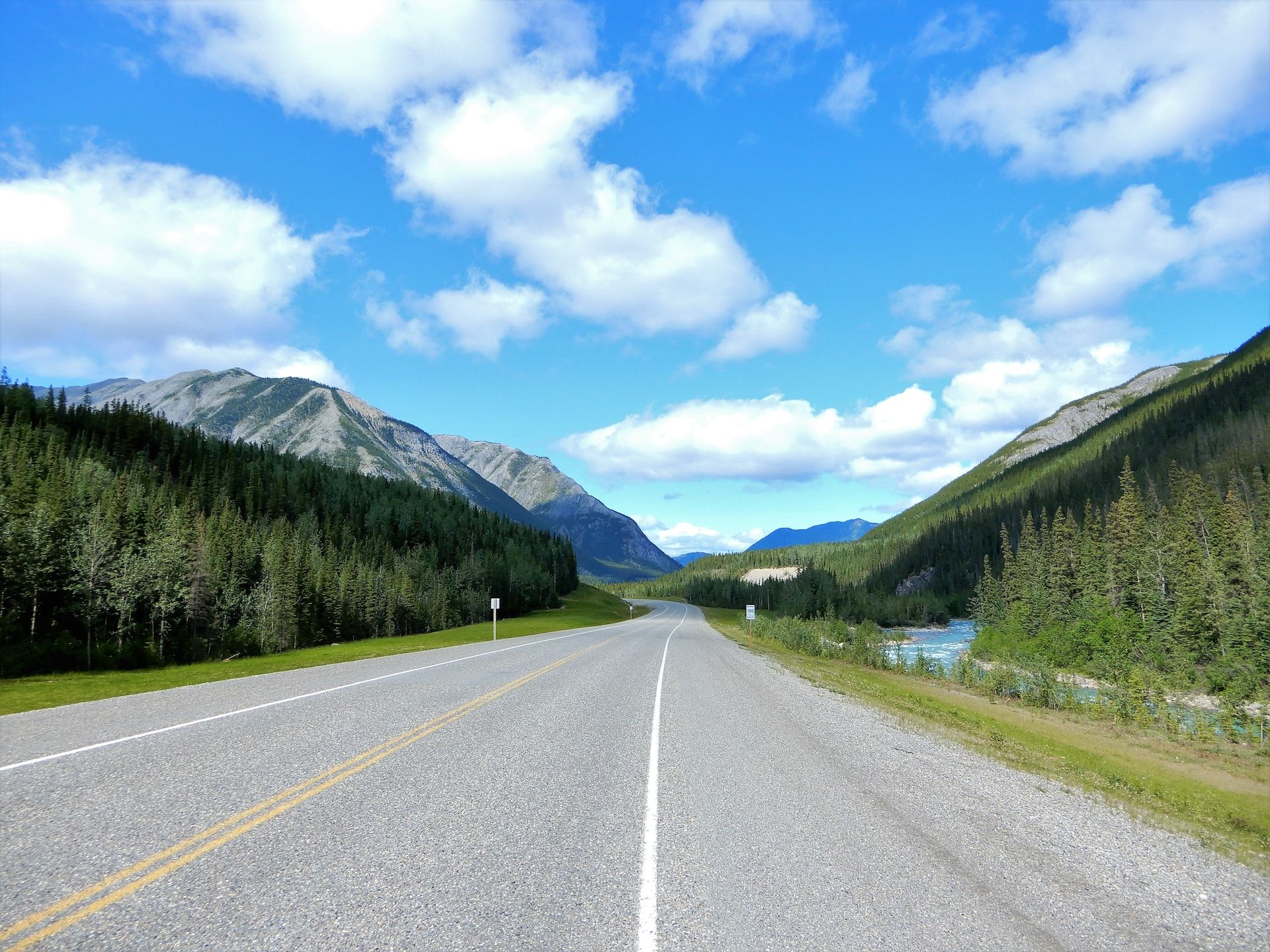 The Alaska highway zipping through the picturesque landscape