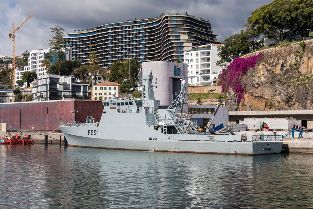 Coastal Patrol Vessel with hotel Savoy in the background in Madeira, Portugal