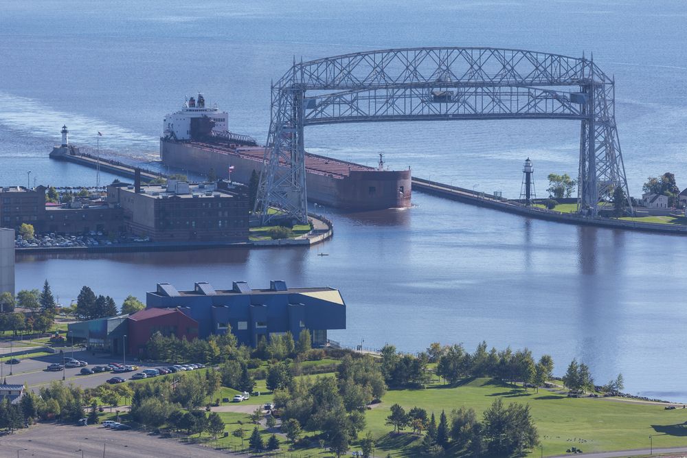 Ship entering Duluth Harbor under the Aerial Lift Bridge in Lake Superior's Port City
