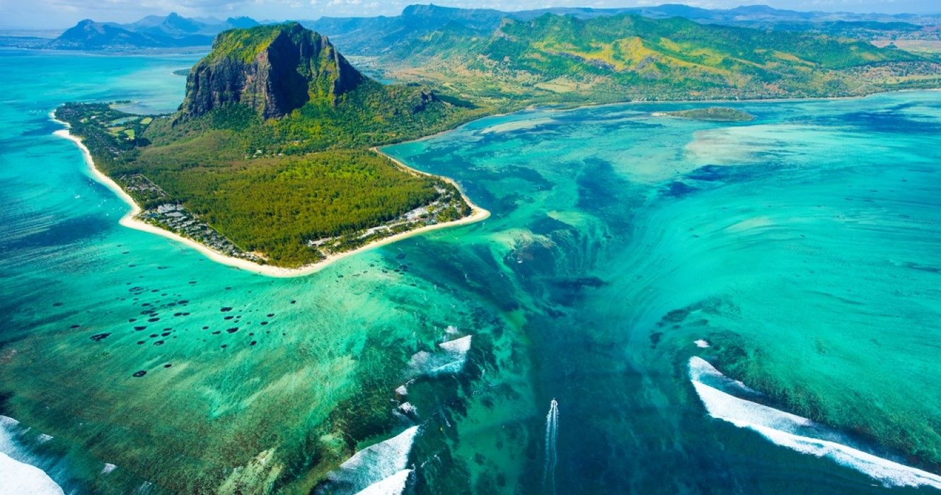 Mauritius island panorama with Le Morne Brabant mountain and underwater waterfall