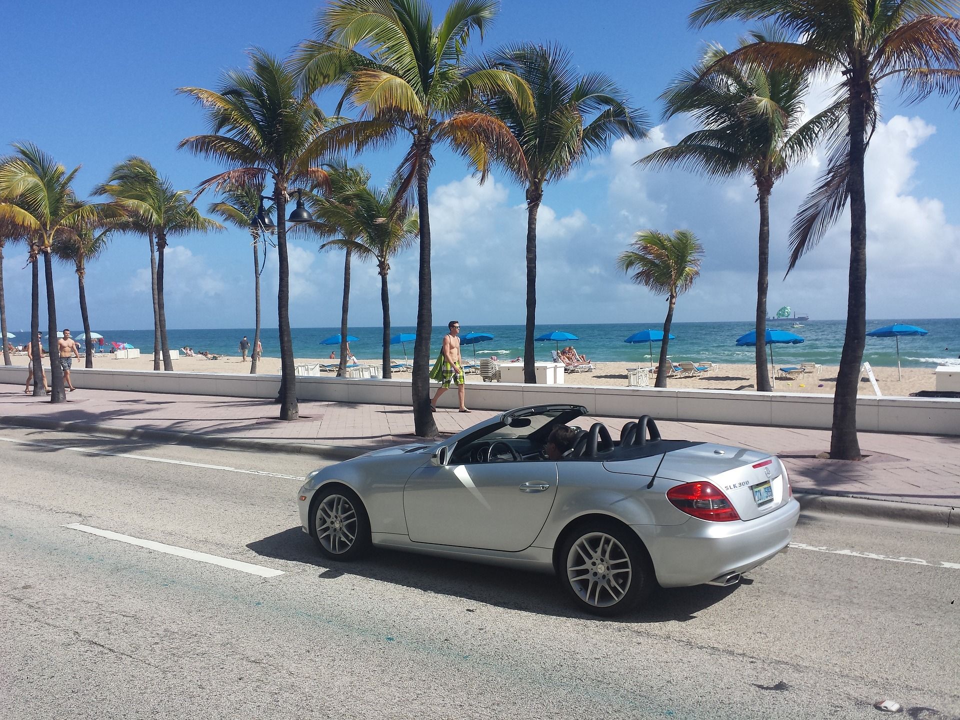 A car driving along Miami Beach, Florida