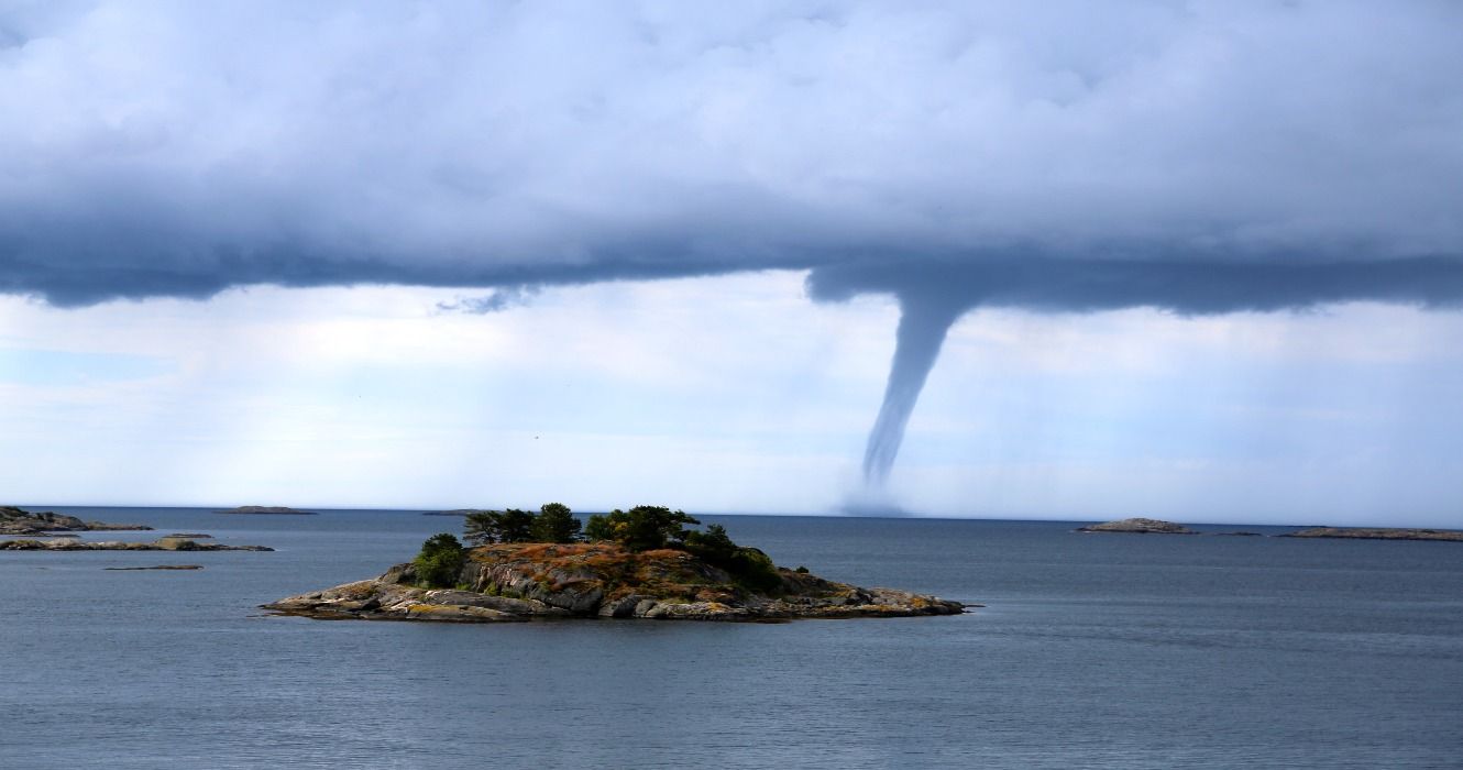 A tornado over the sea during an offshore storm