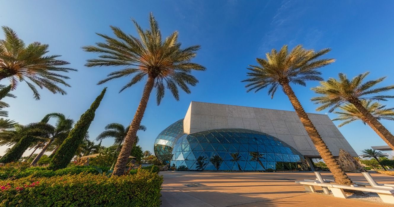 The Dali Museum building between palm trees in St. Petersburg, Florida