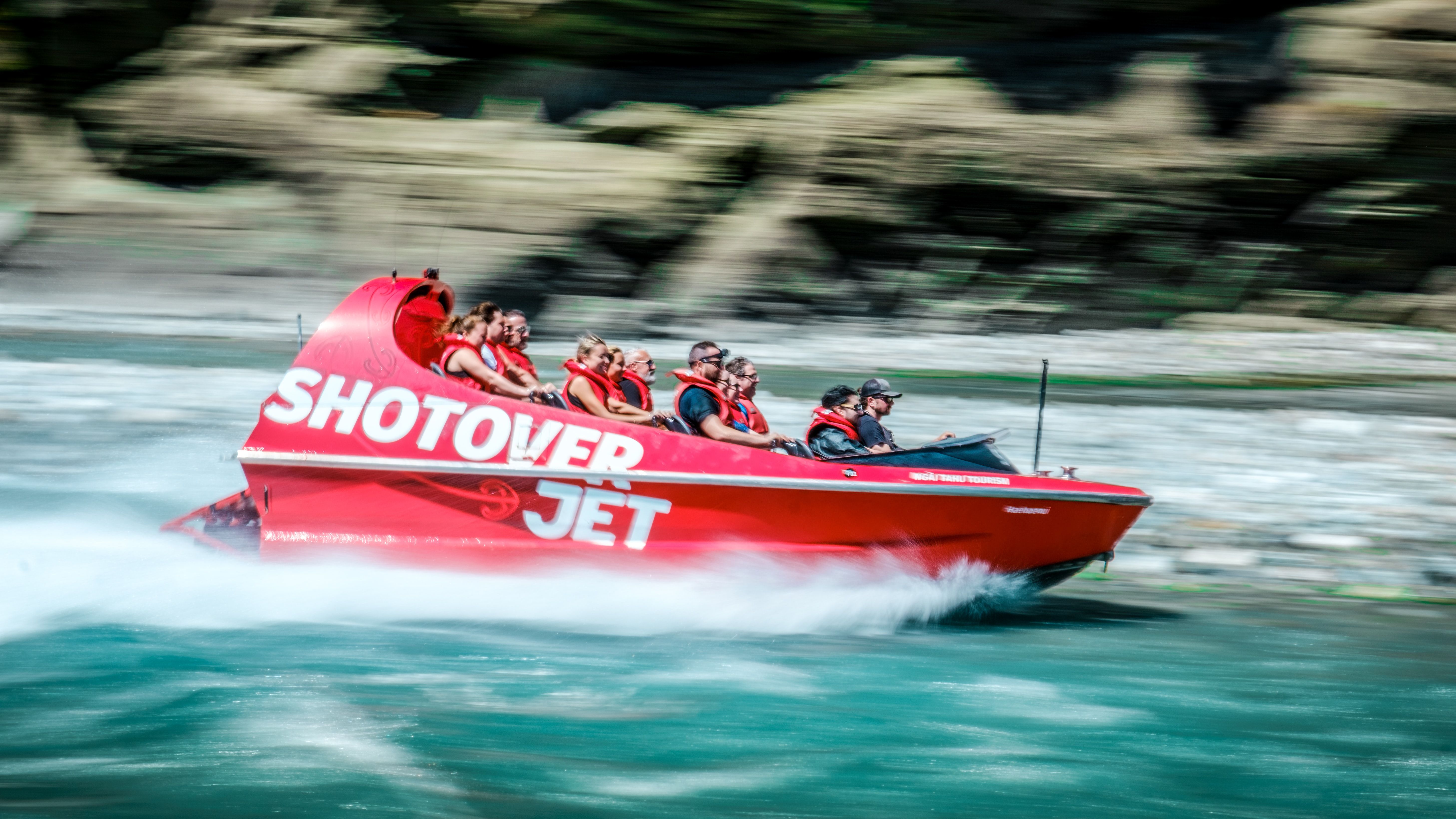 Tourists on the Shotover River In New Zealand