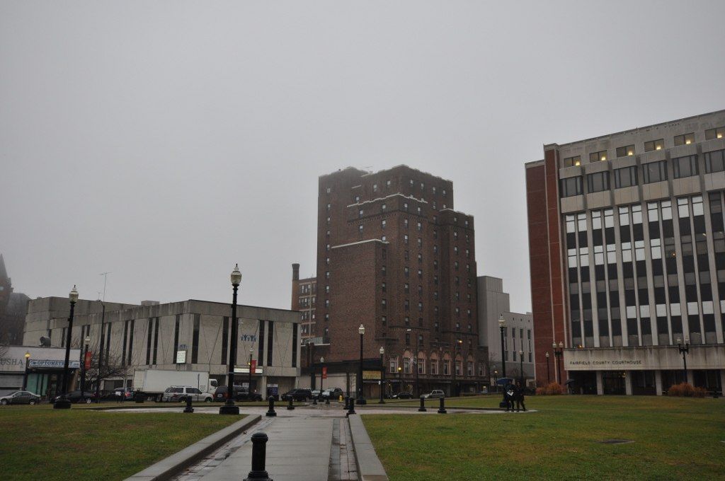 Bridgeport, Connecticut, buildings and green lawn on a gray day