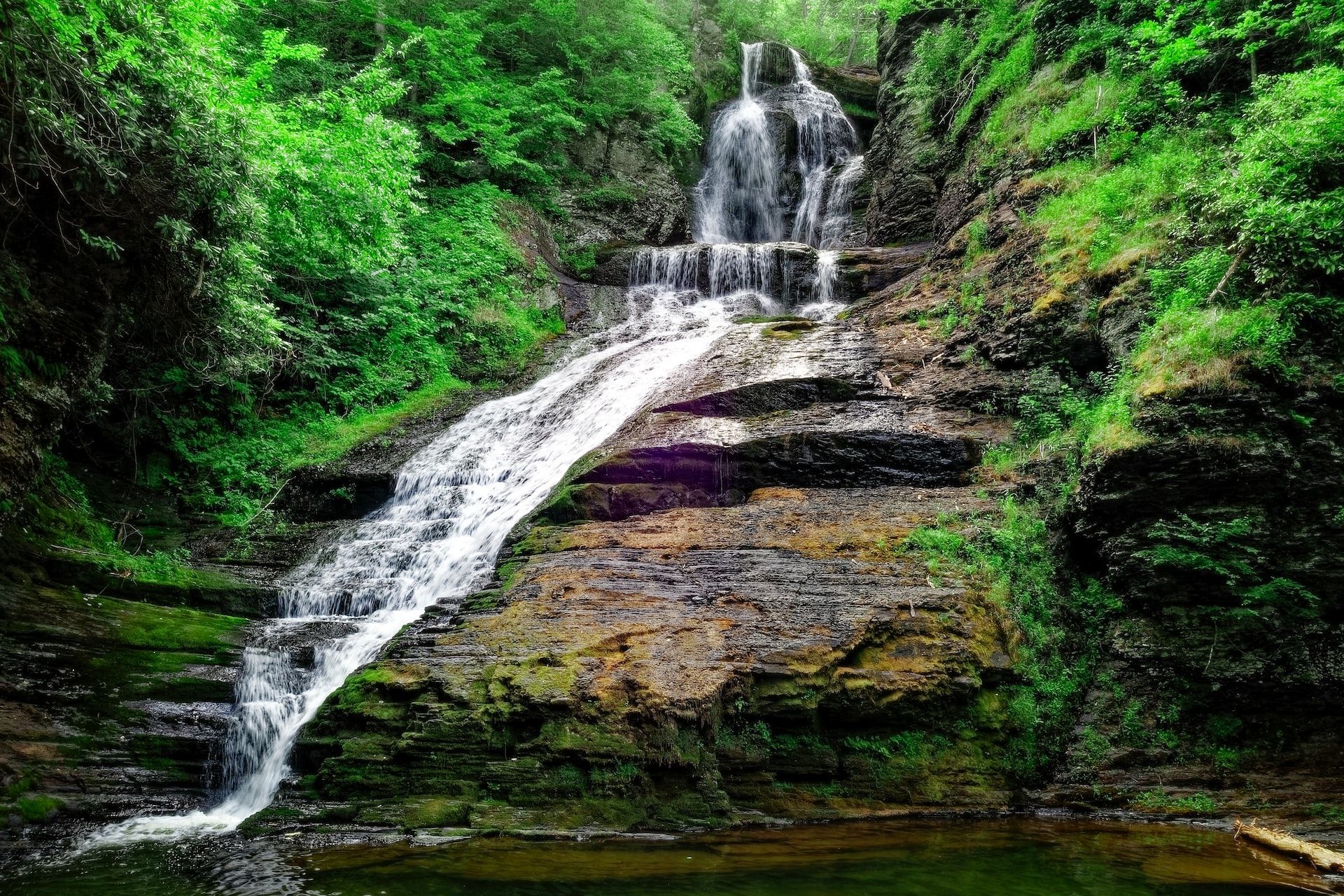 A river with a waterfall and a waterfall bridge at the Delaware Water Gap, Pennsylvania, USA