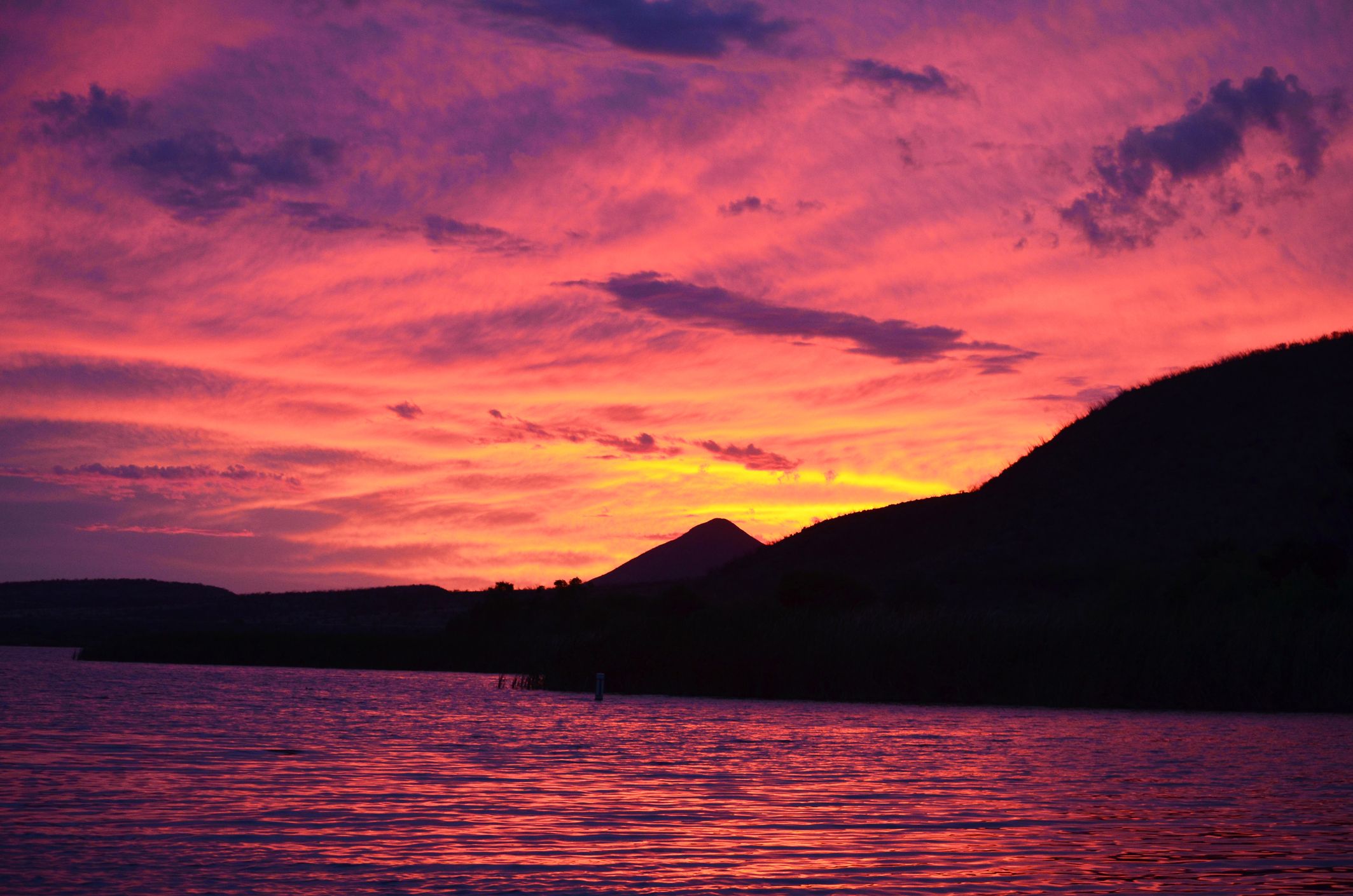 Dramatic view of a beautiful sunset in Patagonia Lake State Park Beach, Nogales, Arizona