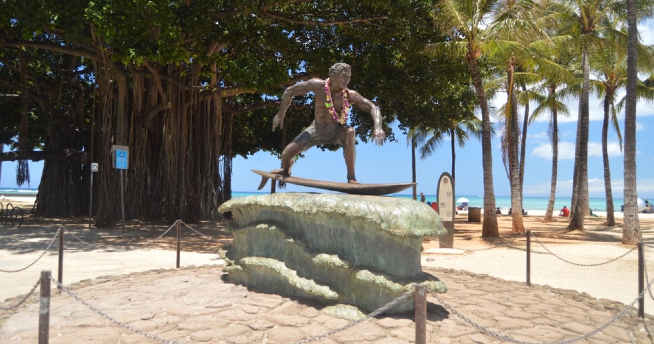 Duke Kahanamoku statue surfing on Waikiki Beach, Oahu, Hawaii