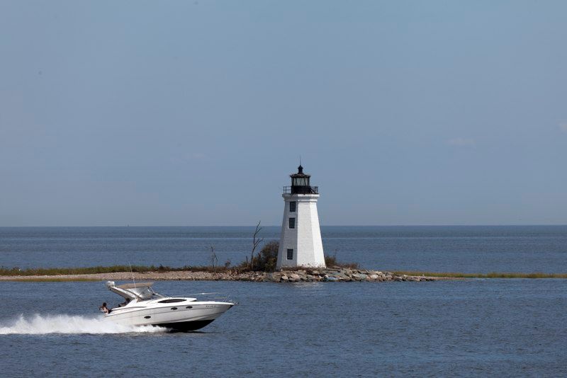 Seaside Park Lighthouse, Bridgeport, Connecticut with boat