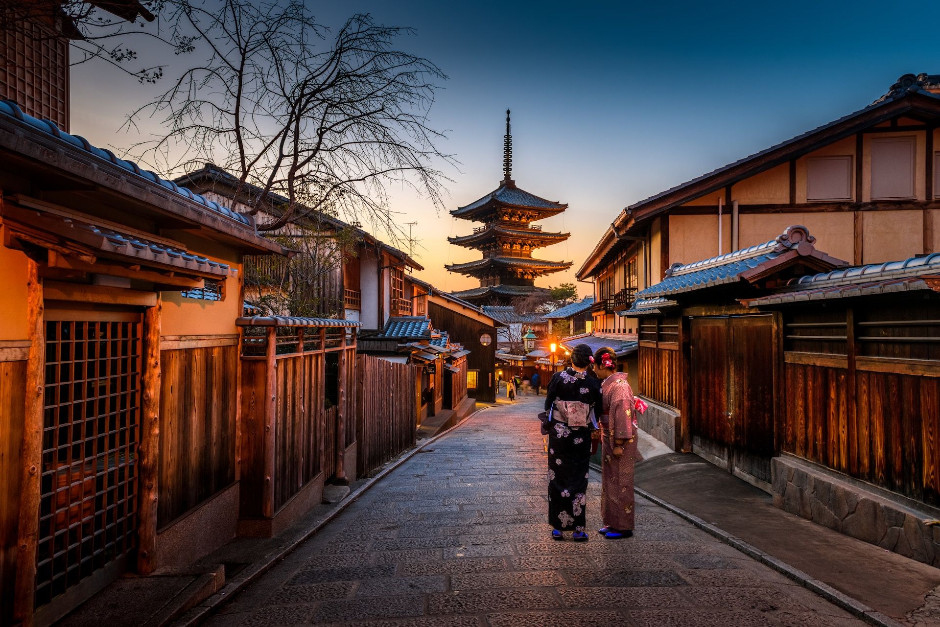 Street in front of Yasaka Pagoda with two geisha, Kyoto, Japan