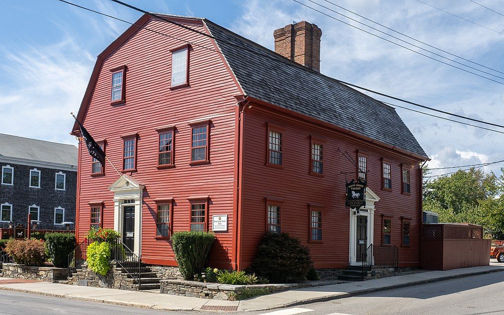 White Horse Tavern side view, Newport, Rhode Island with cloudy sky