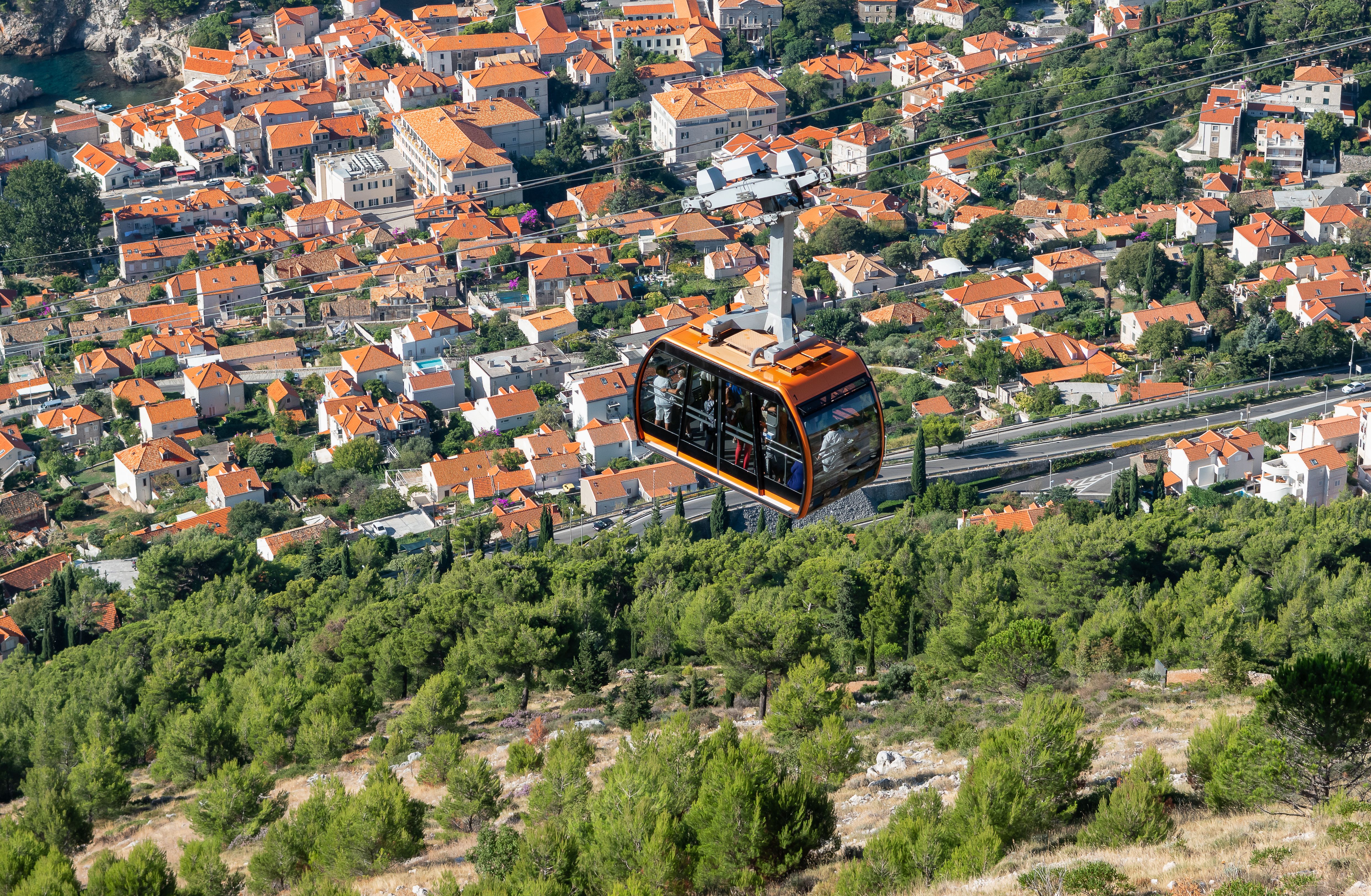 Aerial view of the Old Town and a cable car from Mount Srd in Dubrovnik, Croatia