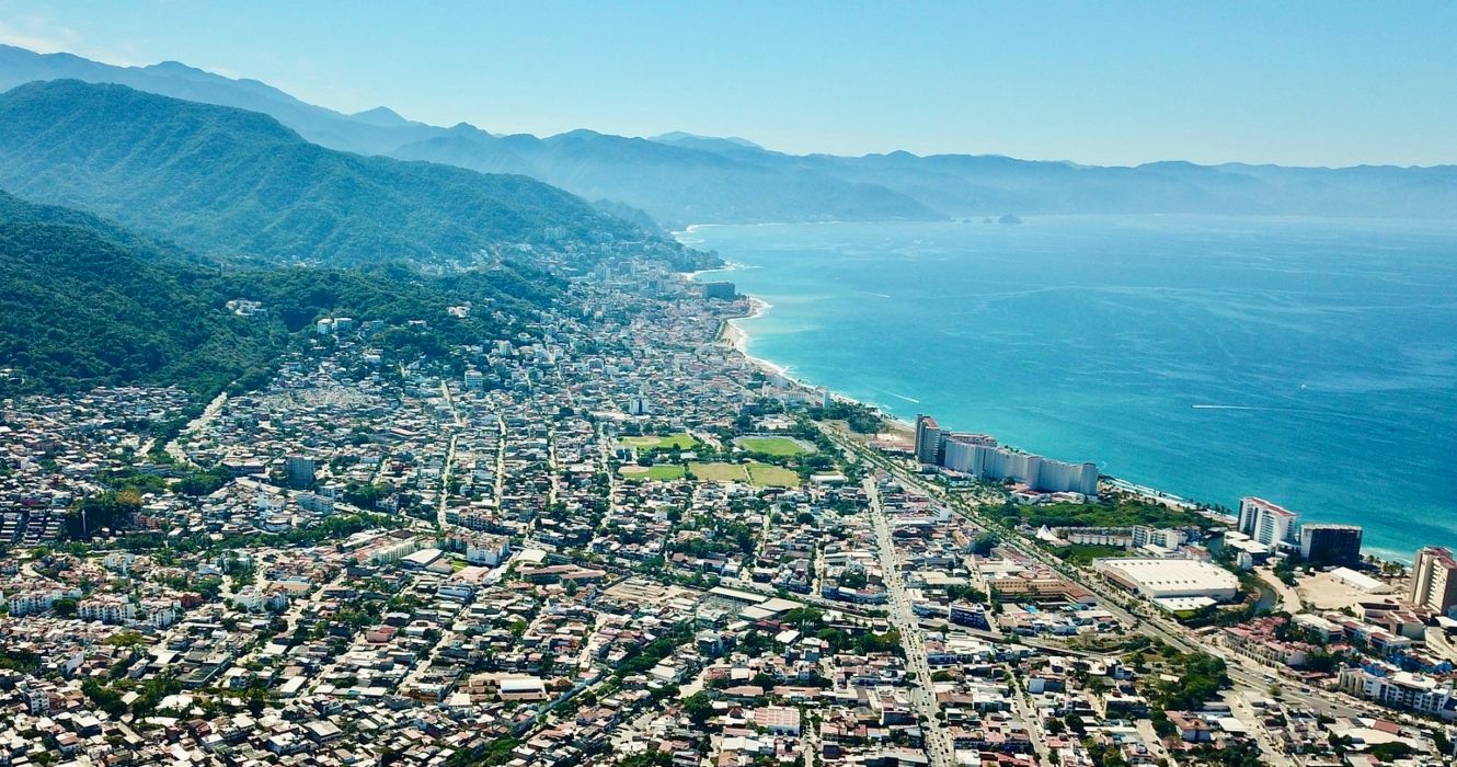 Aerial view of Puerto Vallarta, mountains, and ocean