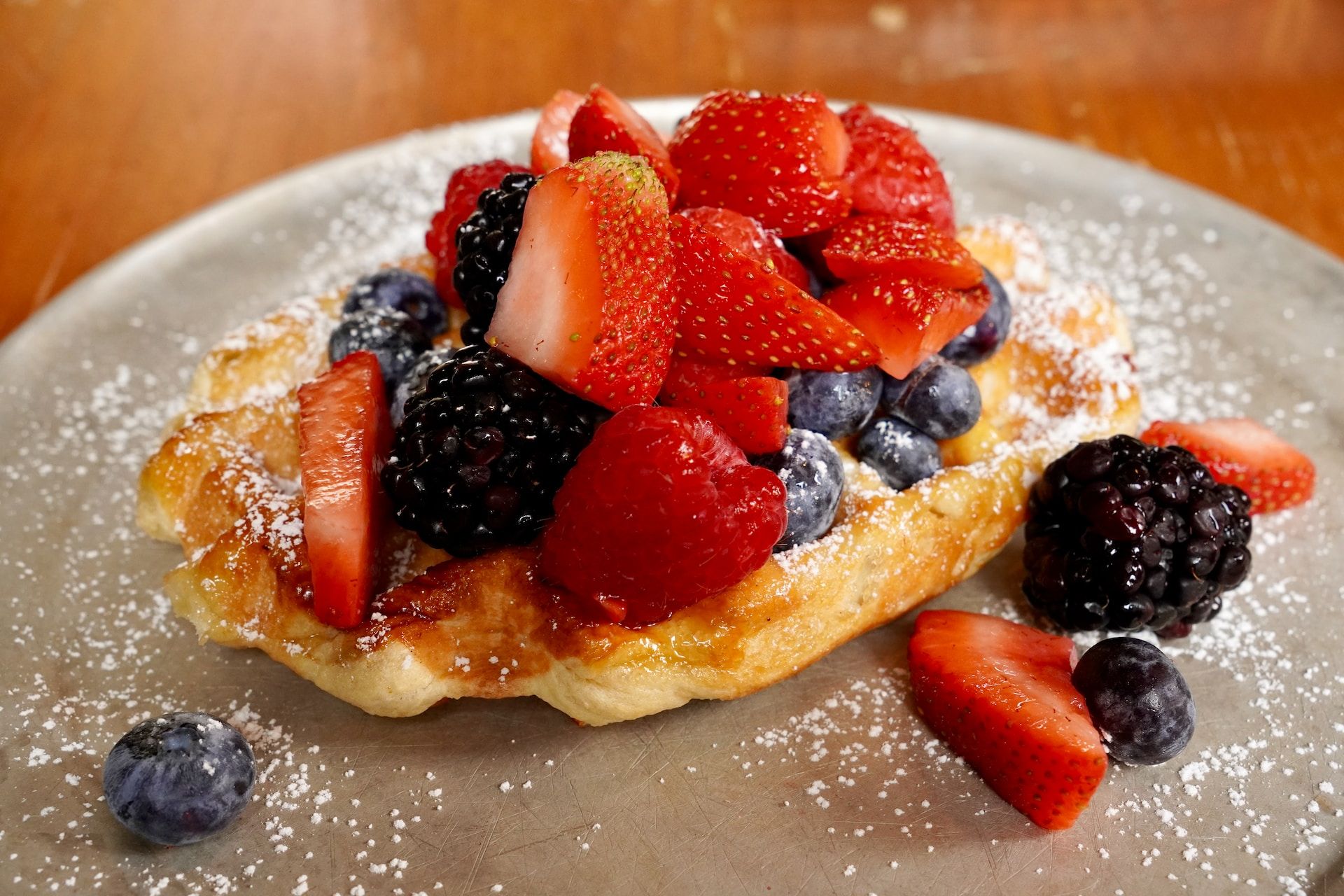 A plate of waffles and strawberries in Brunswick diner in Maine