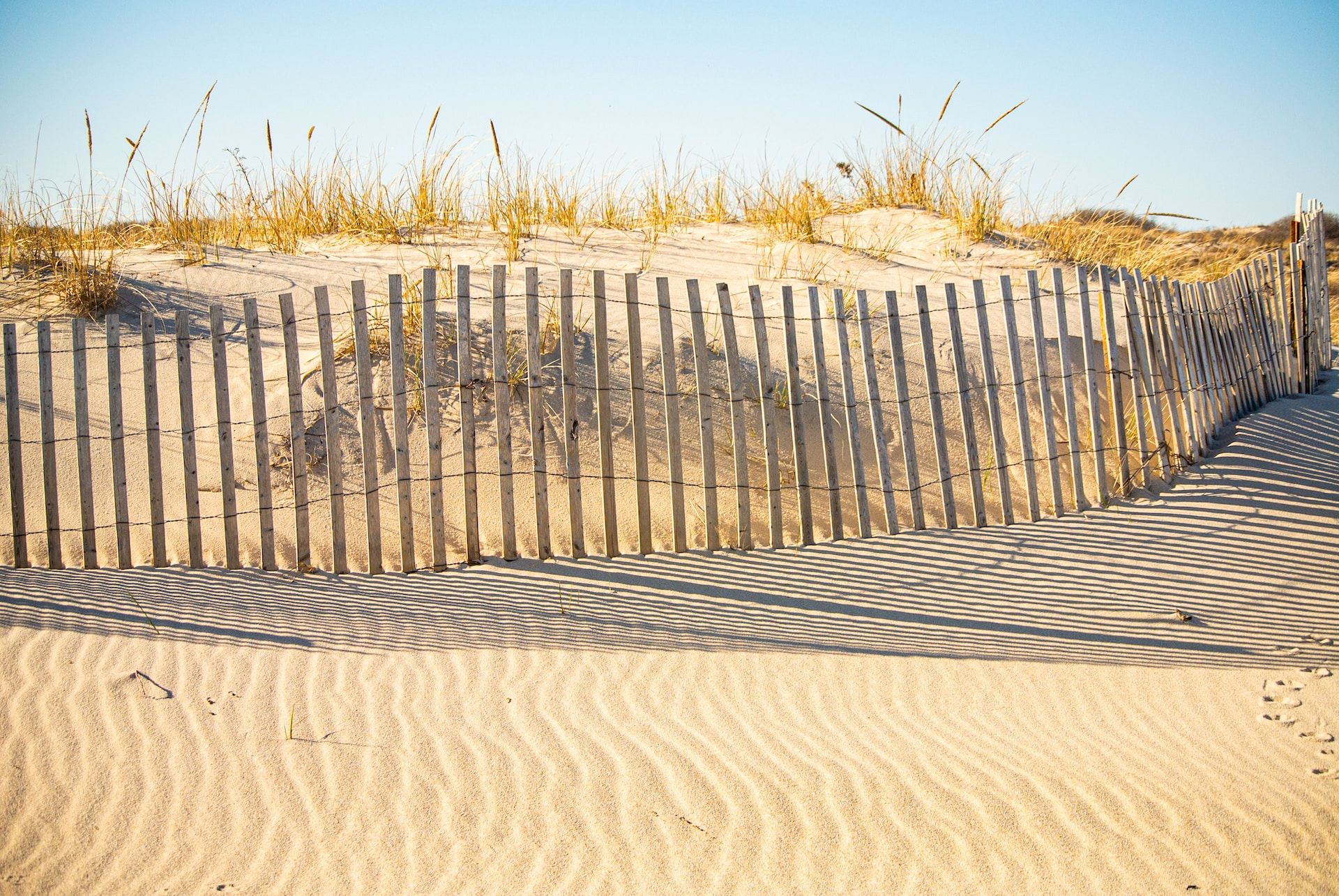 A fence along the sand dunes in Southampton, Long Island, New York