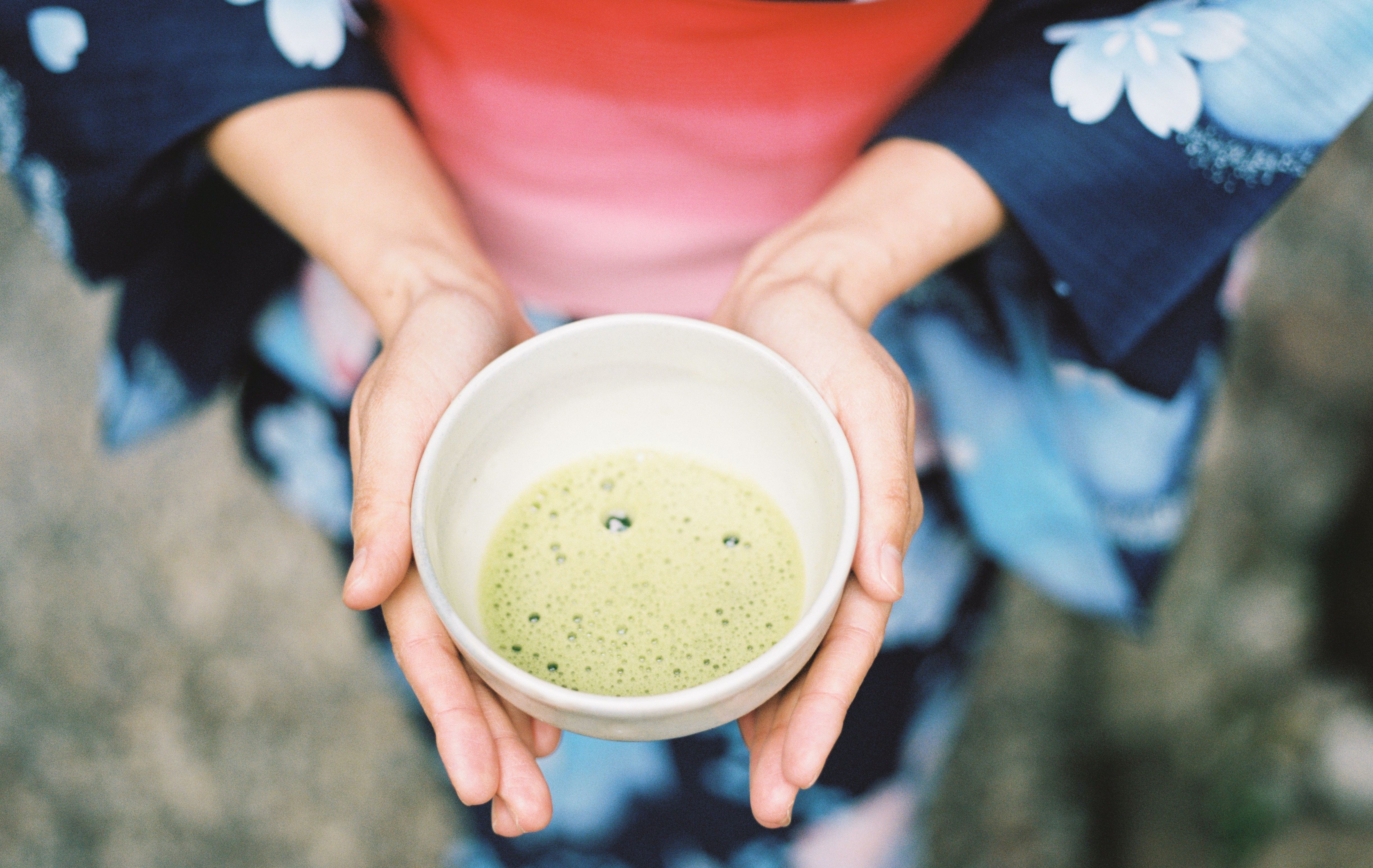 woman holding tea