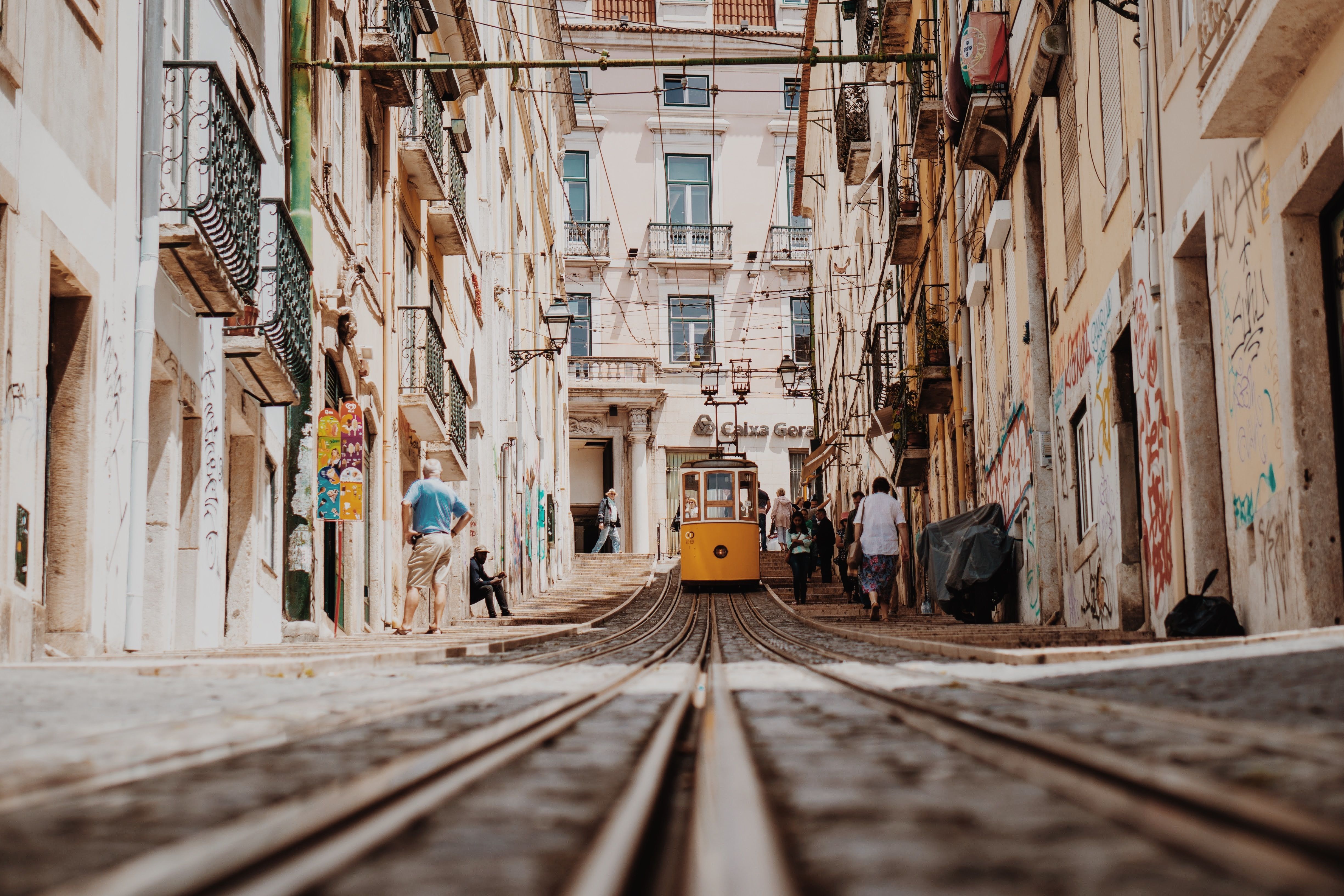 Yellow tram on the streets of Lisbon, Portugal.