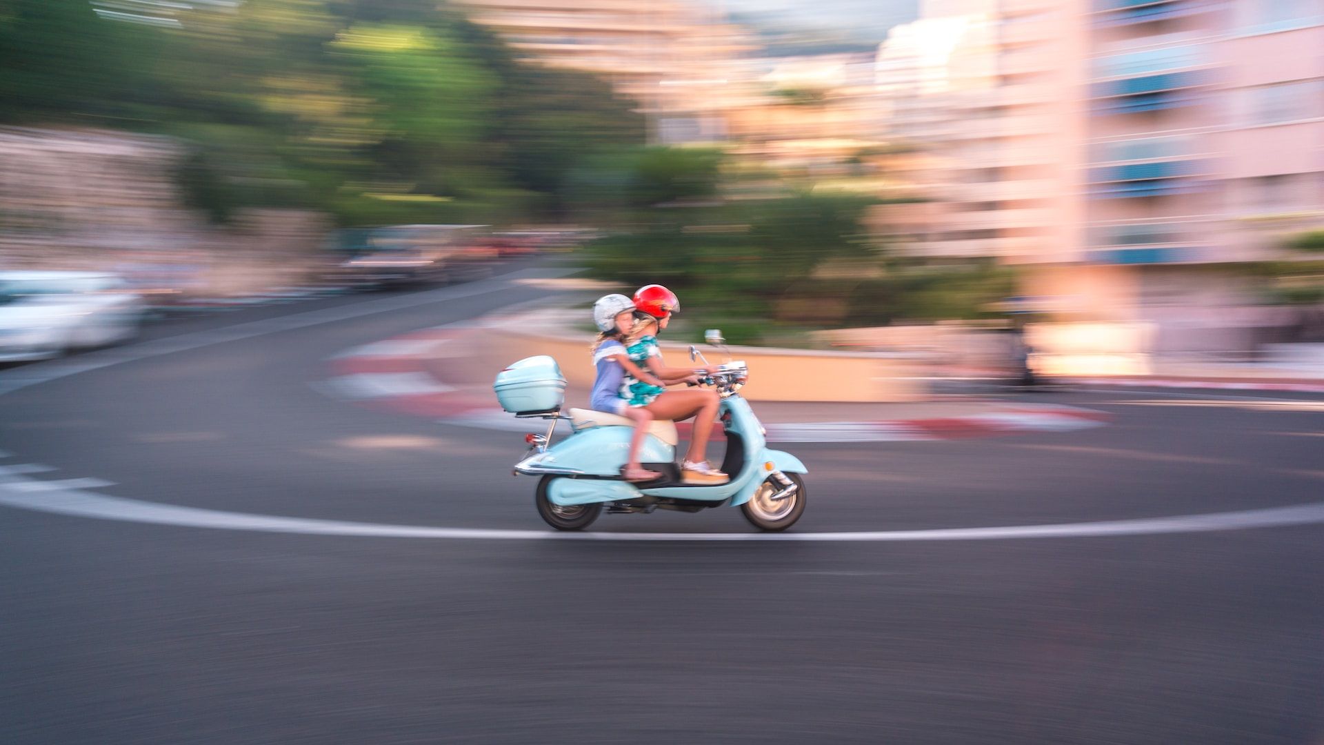 Two people on a bike in Monaco