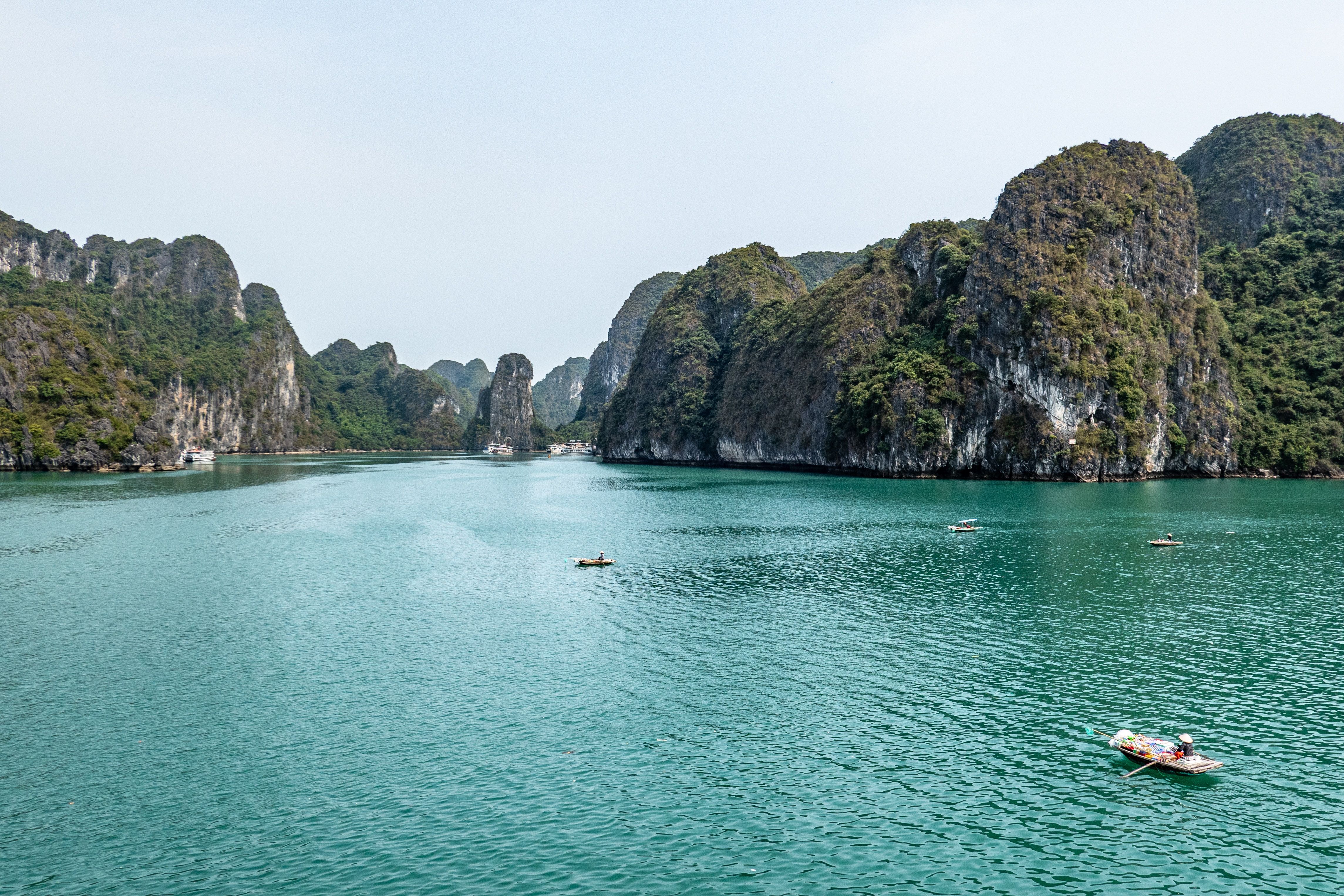 A boat floating on water in Ha Long Bay