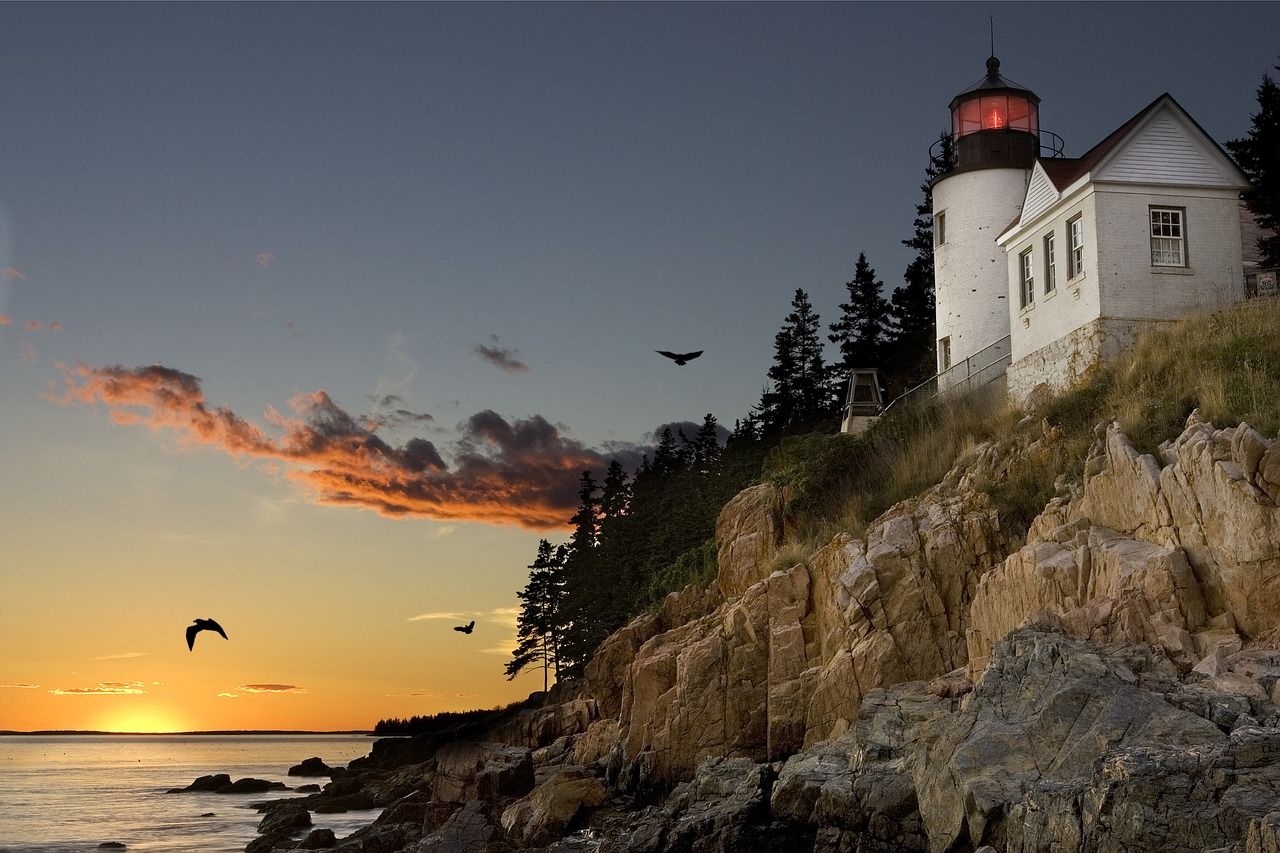 A view of the lighthouse at Bar Harbor at sunset