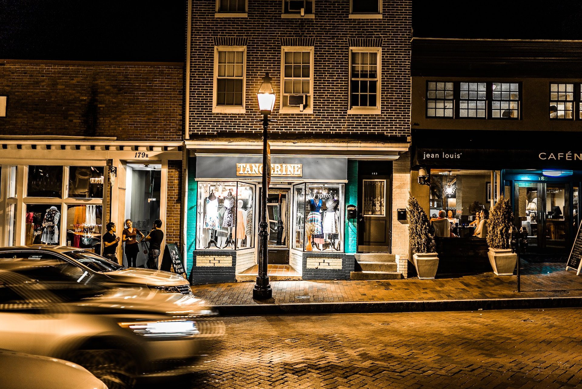 Downtown storefronts at night in Annapolis, Maryland