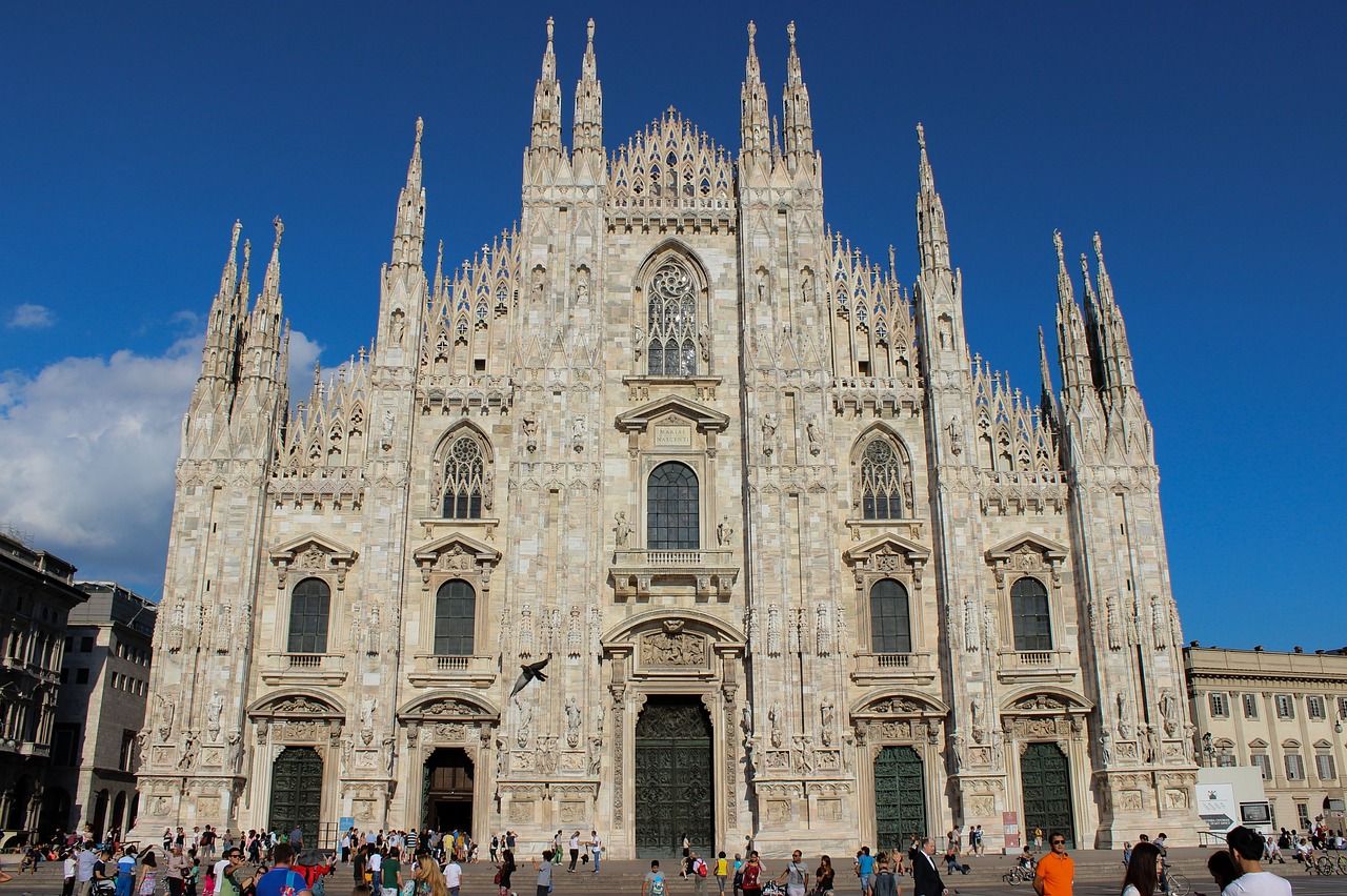 View of the front exterior of the Duomo de Milano in Milan, Italy