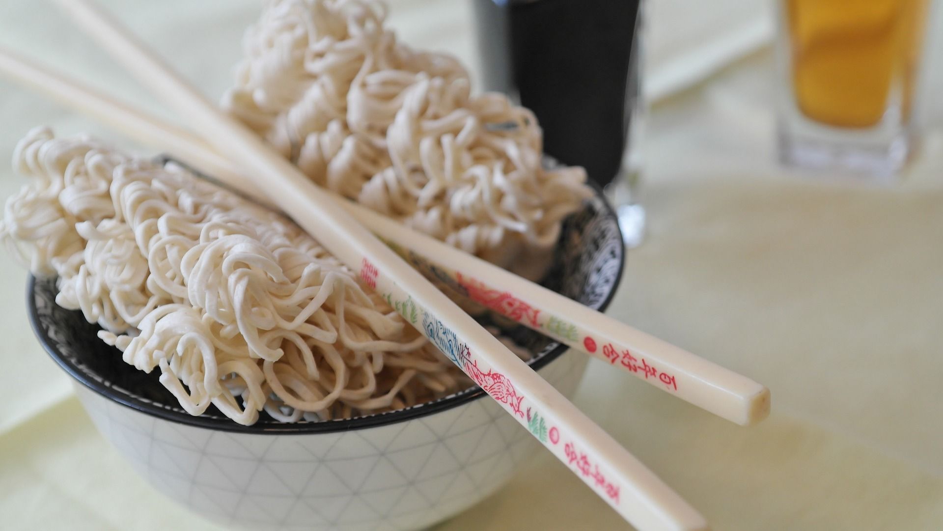 A bowl of instant ramen with chopsticks