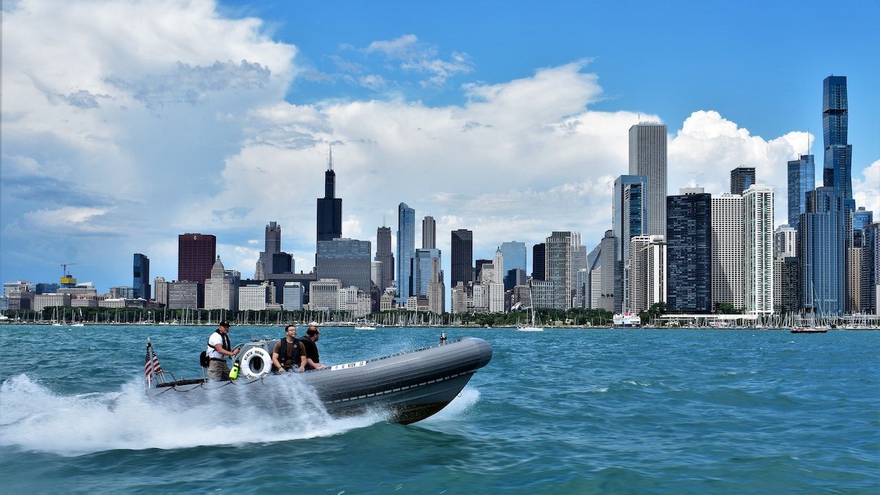 View of a boat on Lake Michigan passing by the Chicago skyline 
