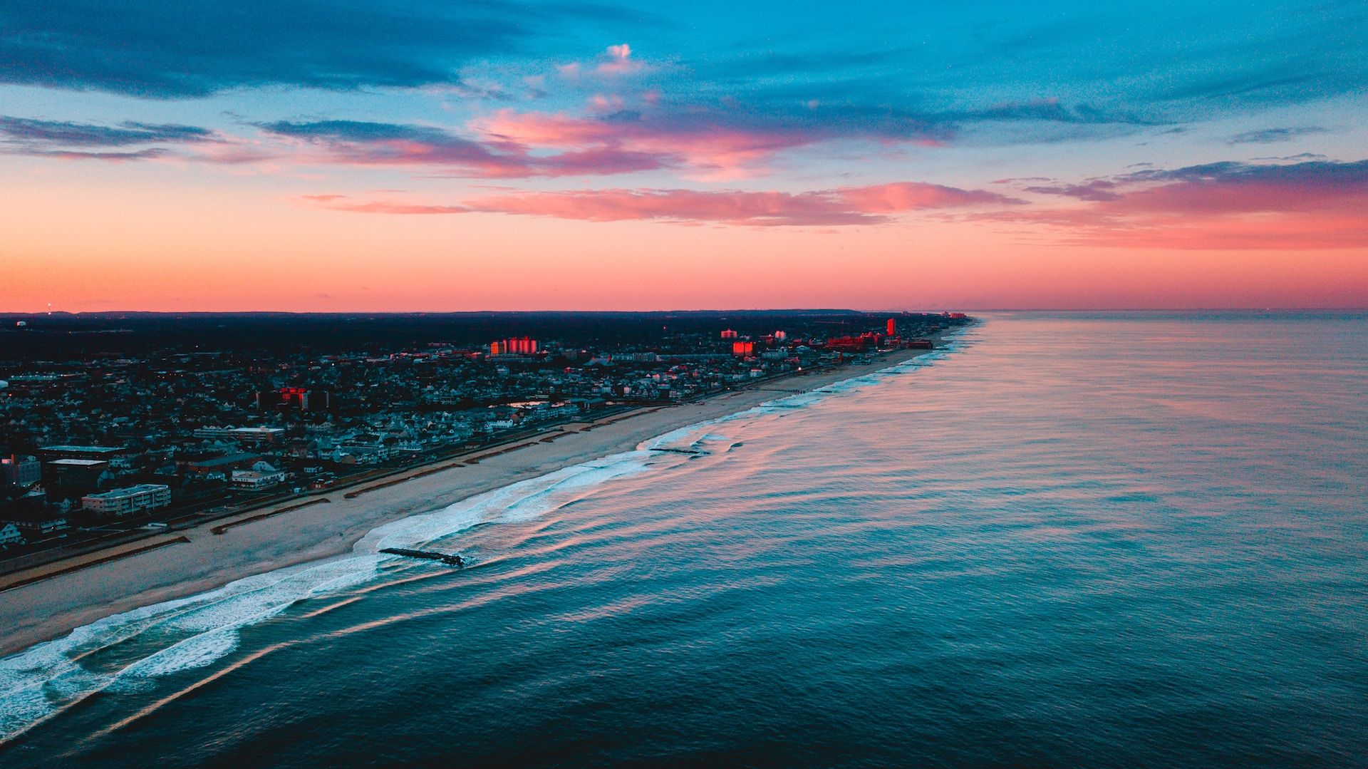 An aerial view of the city, beach, and ocean in Asbury Park, New Jersey, USA