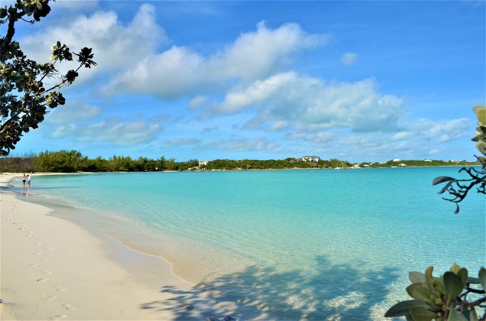 People on the shore of Great Exuma Beach