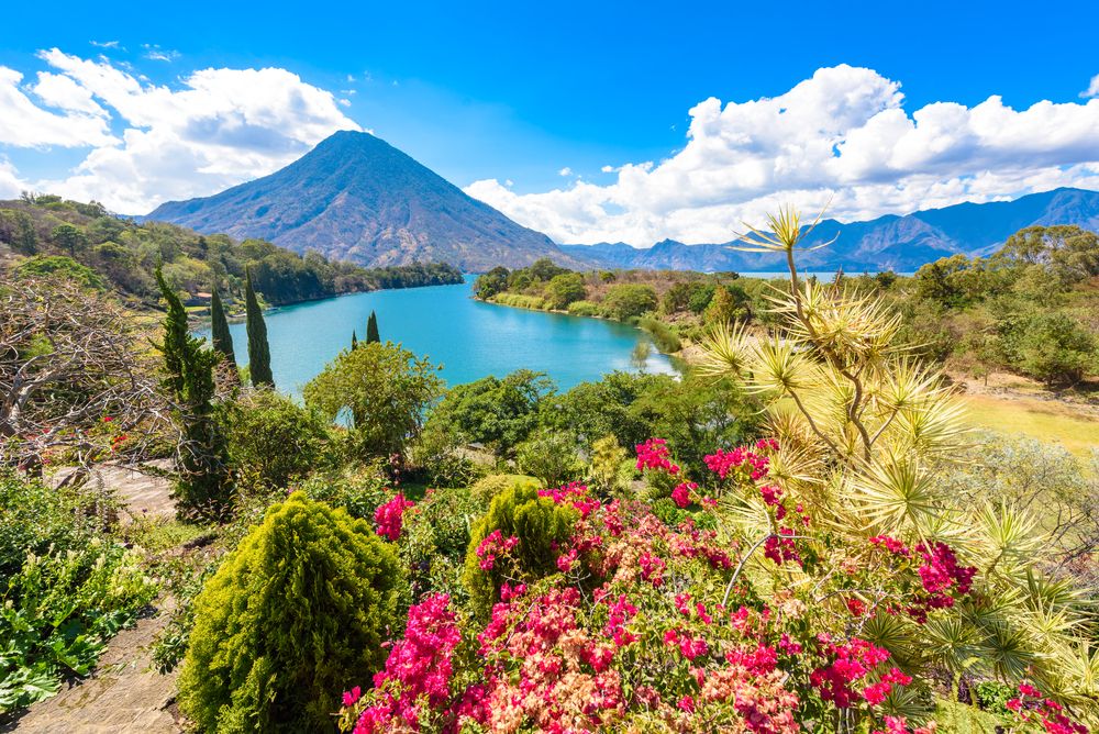 The beautiful bay of Lake Atitlan with a view of volcano San Pedro in the highlands of Guatemala, Central America