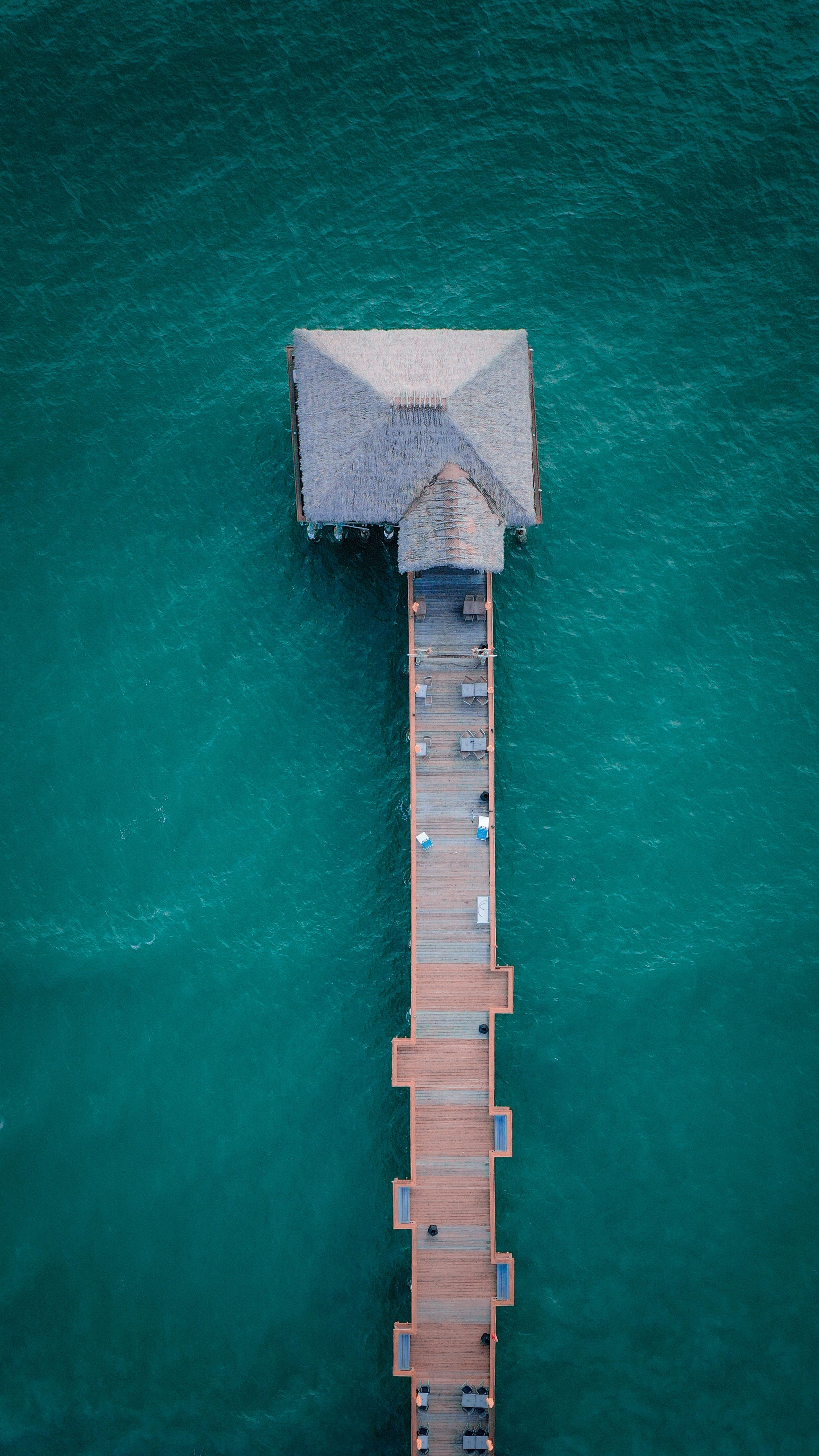 An aerial view of Cocoa beach pier extending into the ocean, Florida, USA