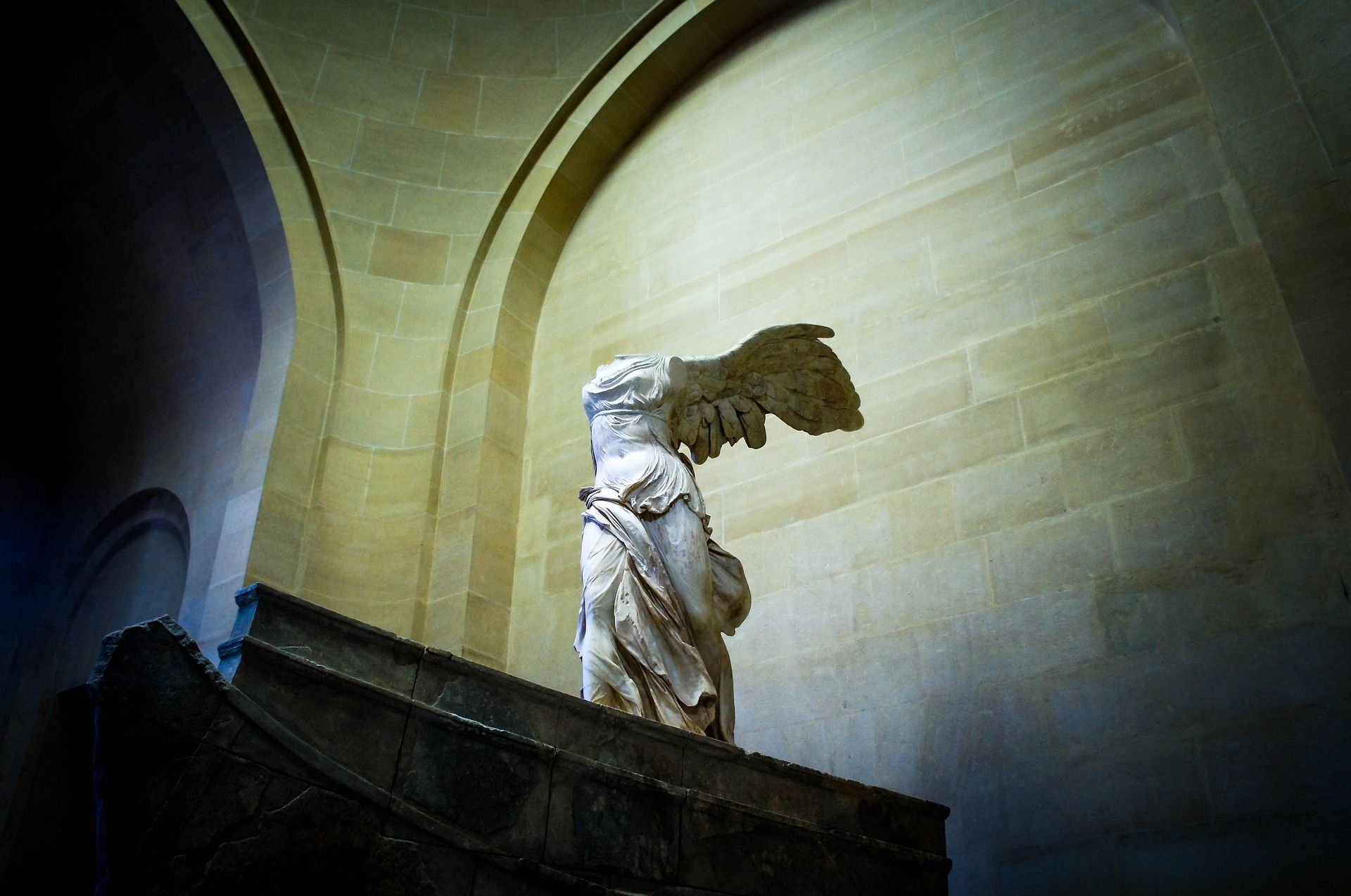 A view of the a statue of goddess Nike declaring victory at the Louvre museum