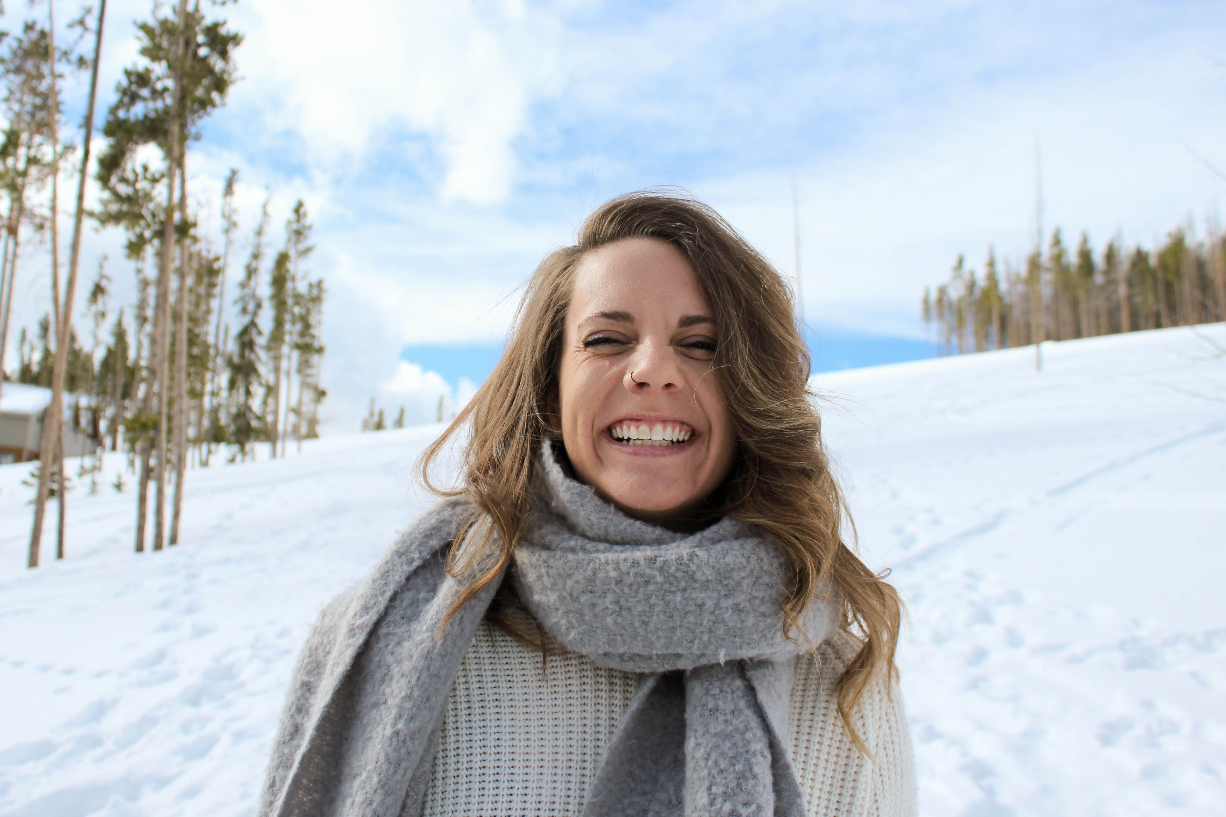 Woman wearing scarf in snow