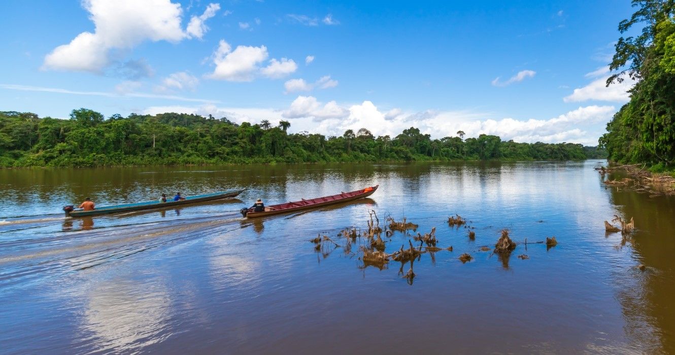 Wooden Boats Along The Suriname River In Brokopondo District, South America