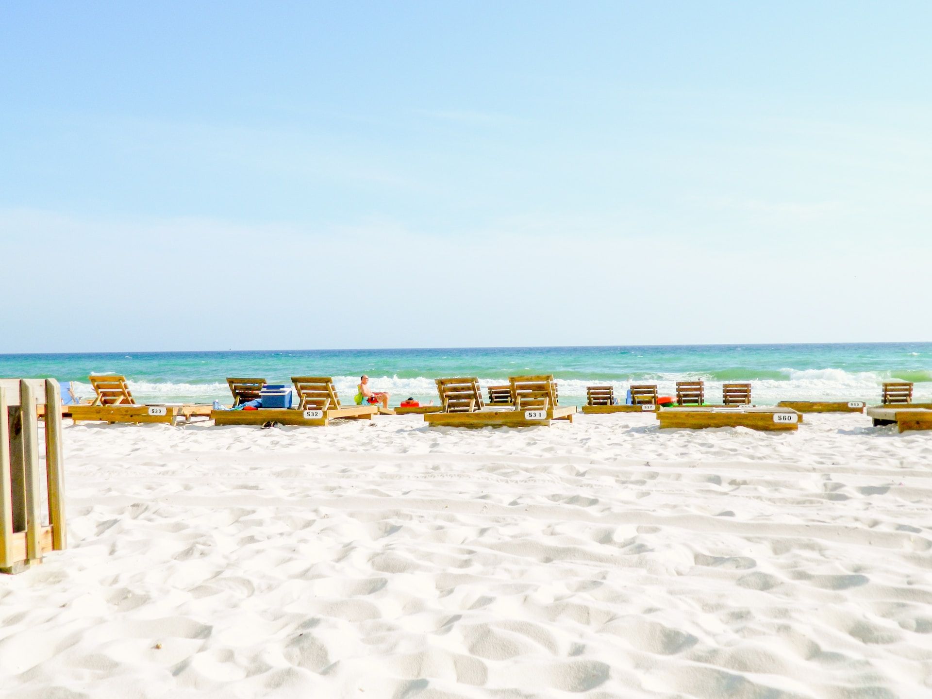 Beach chairs in the white sand of Panama City Beach, Florida