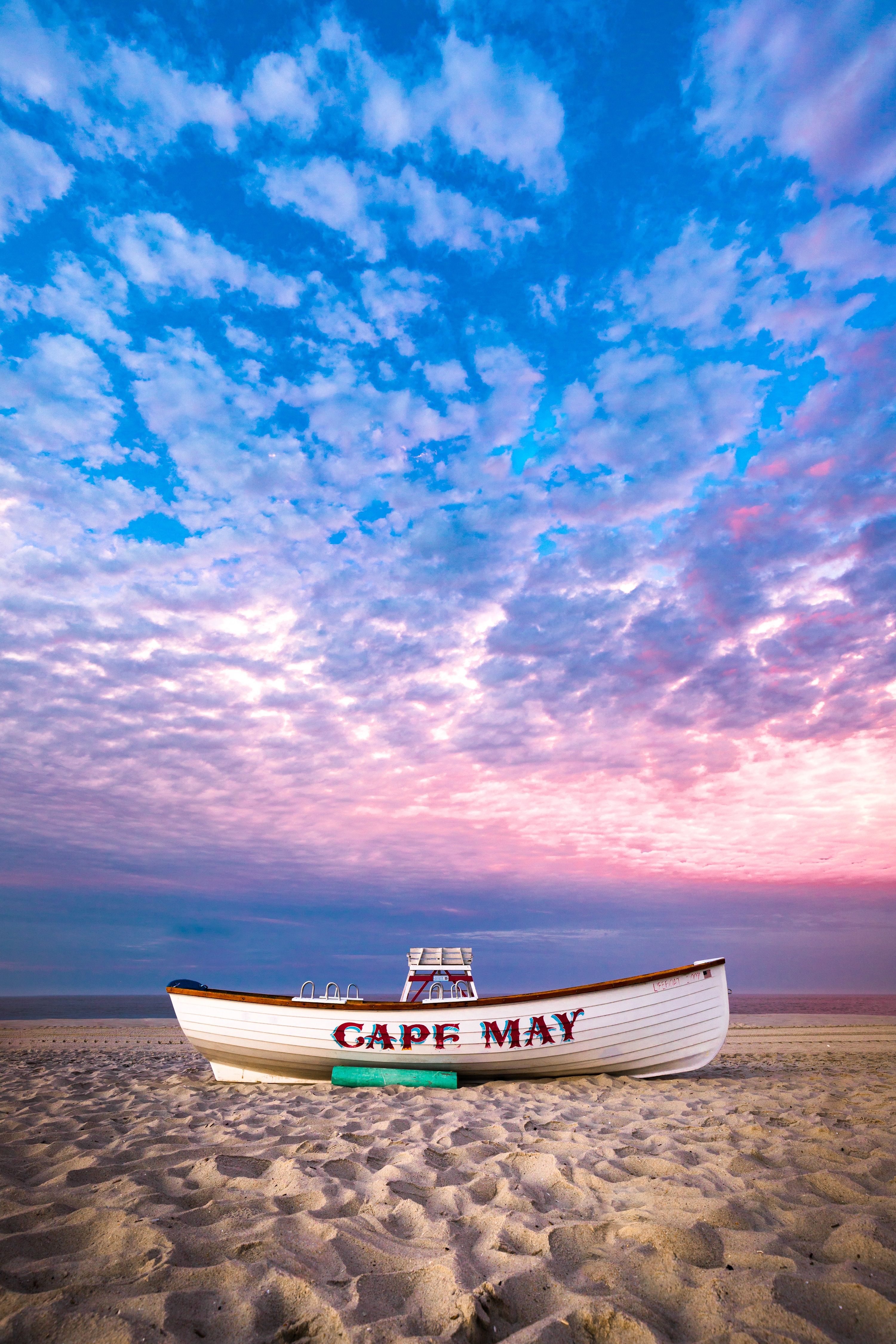 Decorative boat on a beach in Cape May, New Jersey 