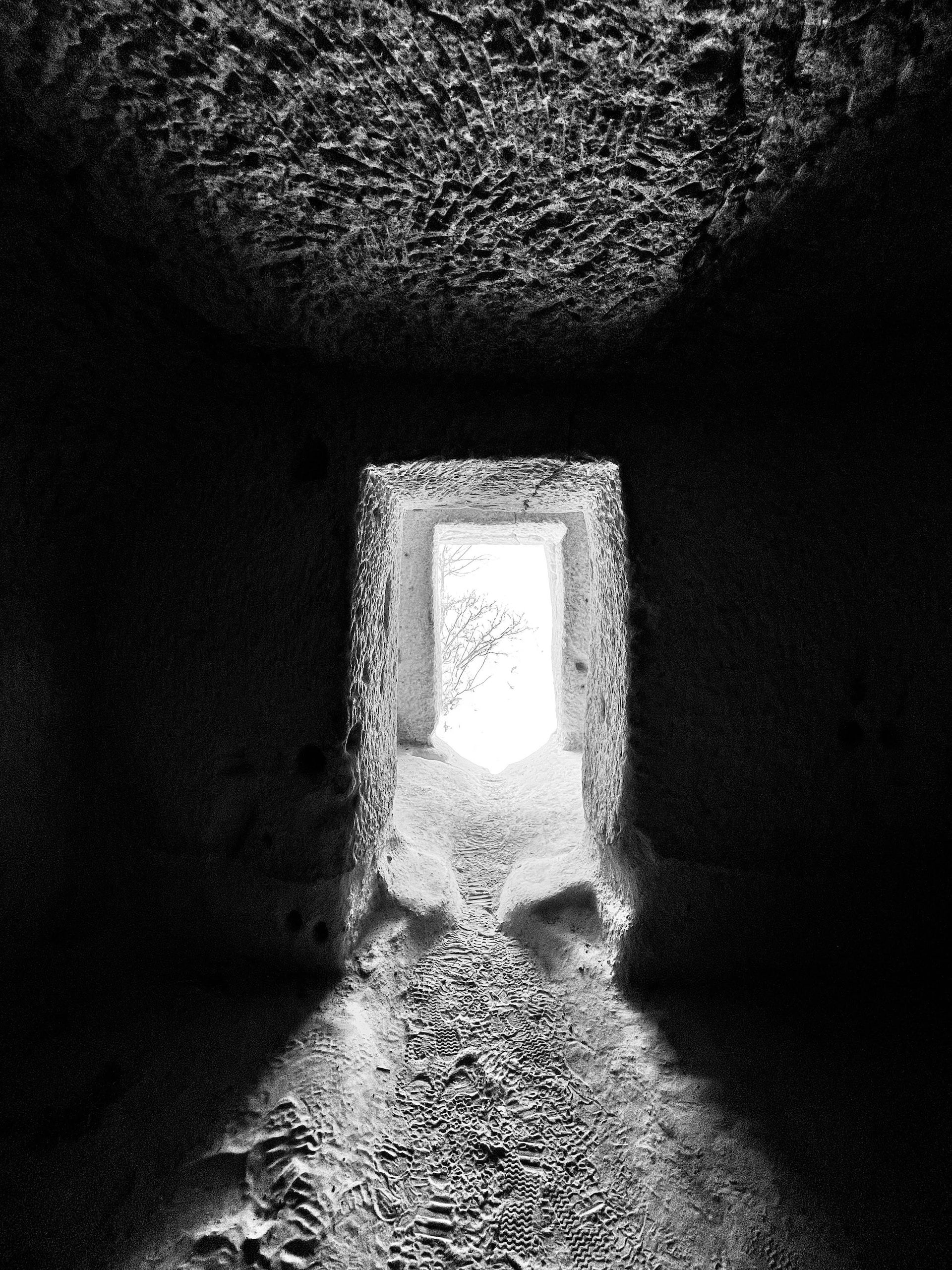 An open door in an underground tunnel